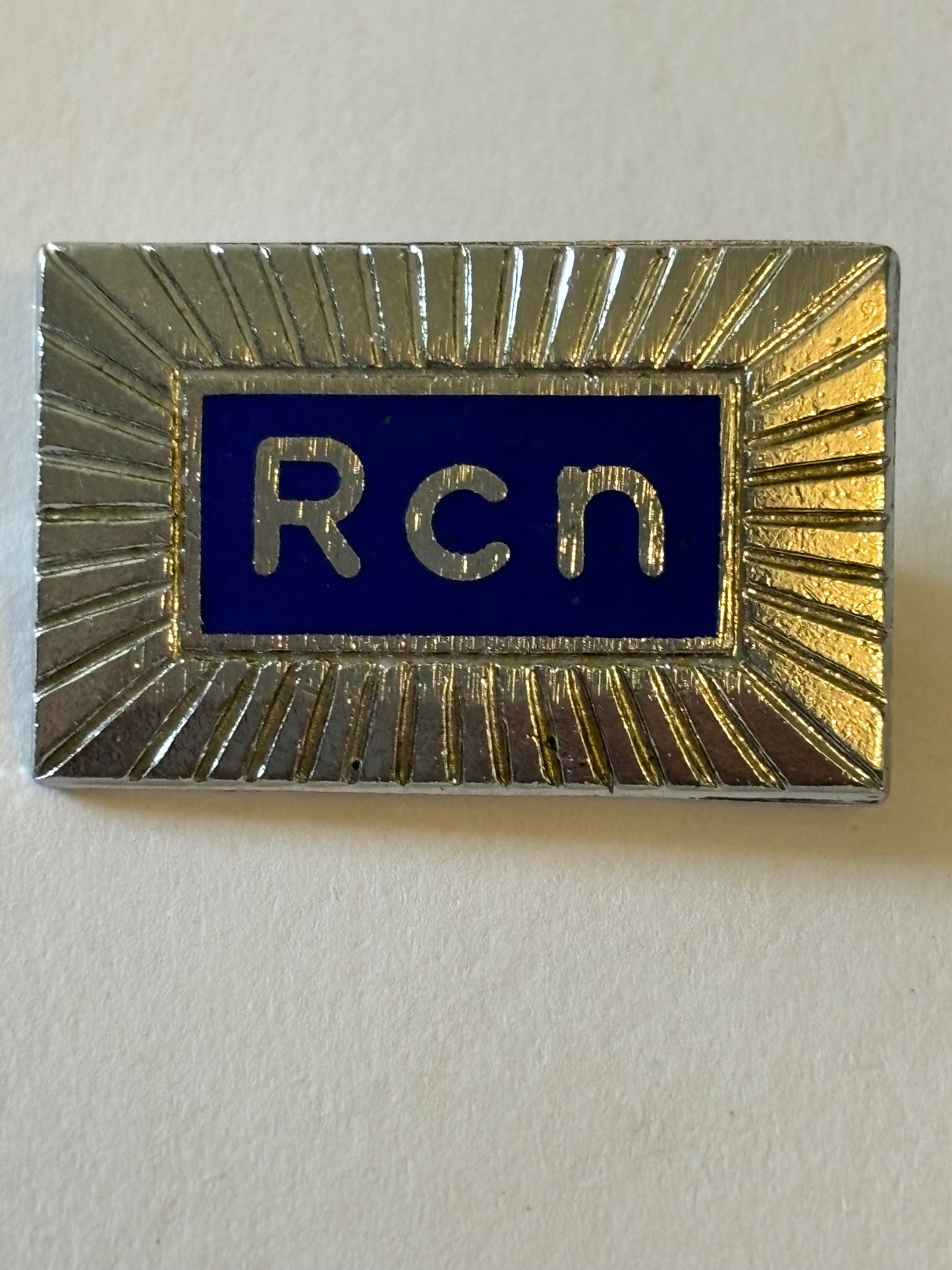 Silver and Blue metal RCN badge