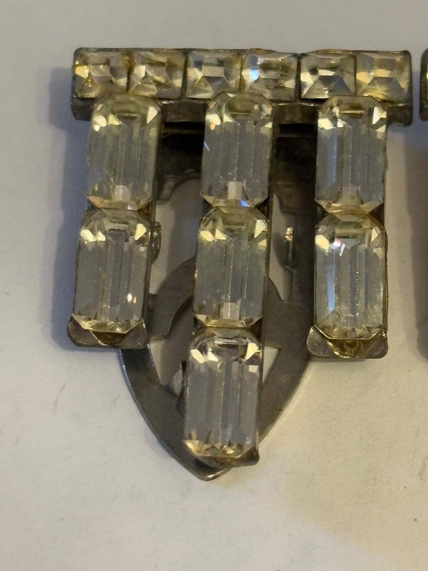 Pair of matching vintage silver metal dress clips with baguette white stones