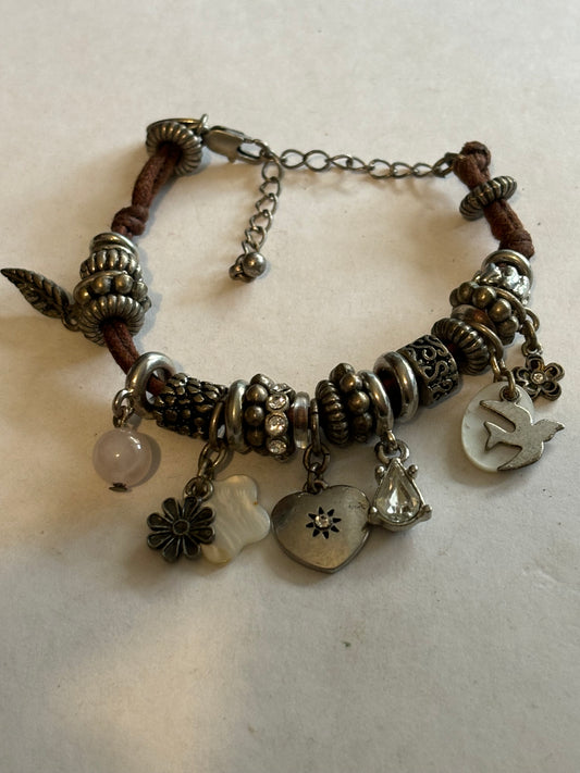 NEXT - Brown string and silver charm bracelet