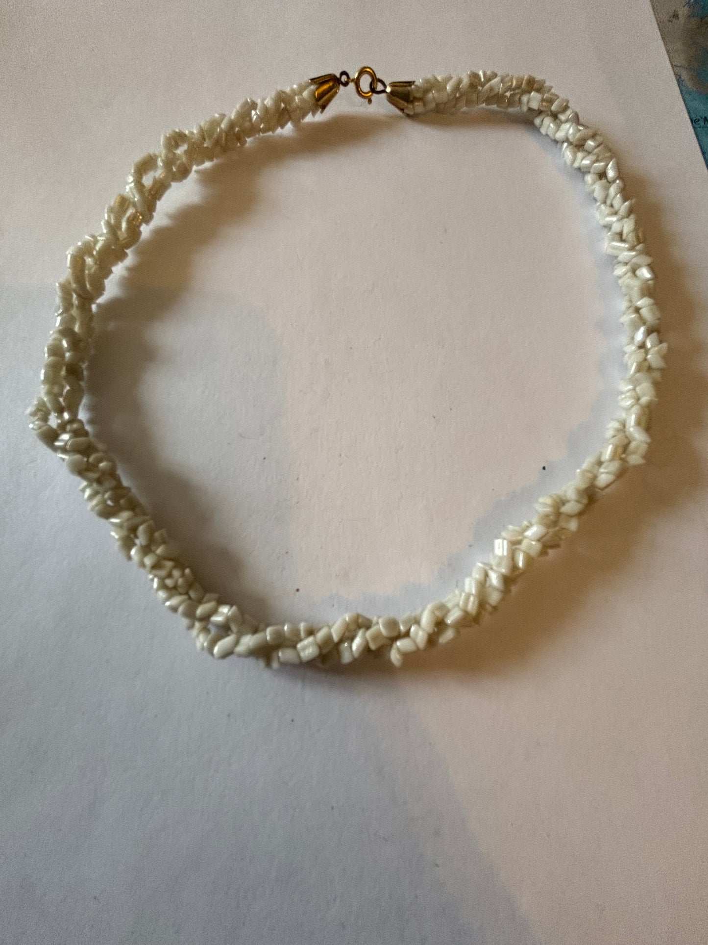 Triple twisted rocky white bead necklace