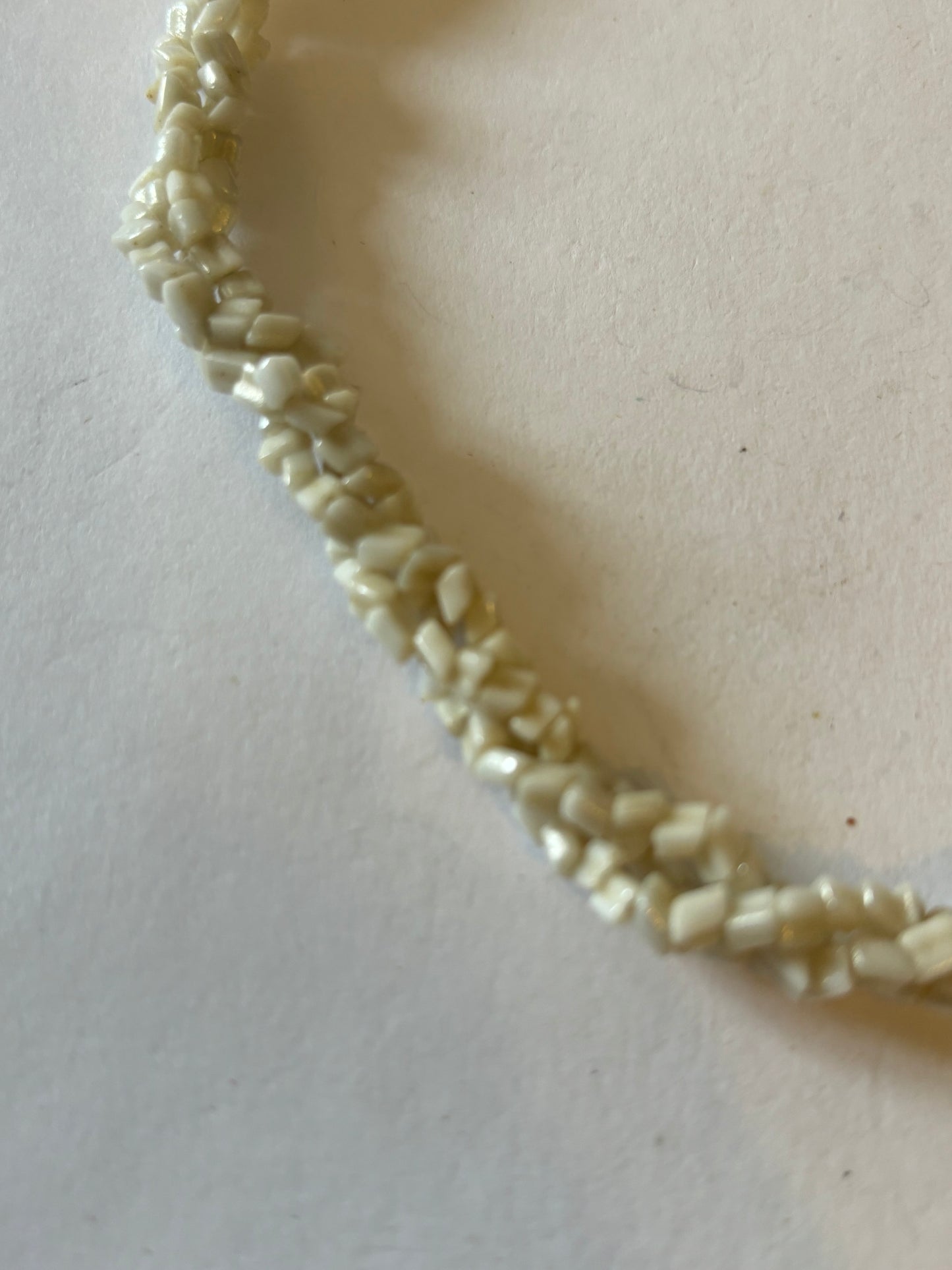 Triple twisted rocky white bead necklace