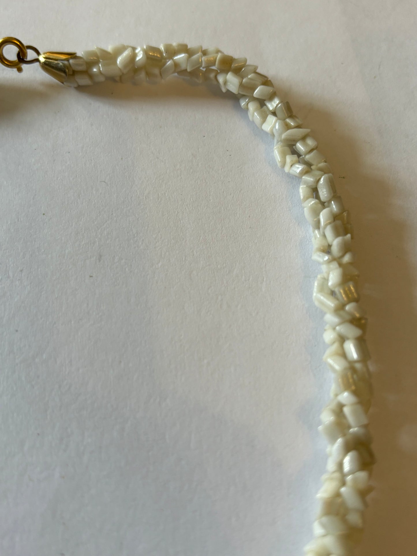 Triple twisted rocky white bead necklace