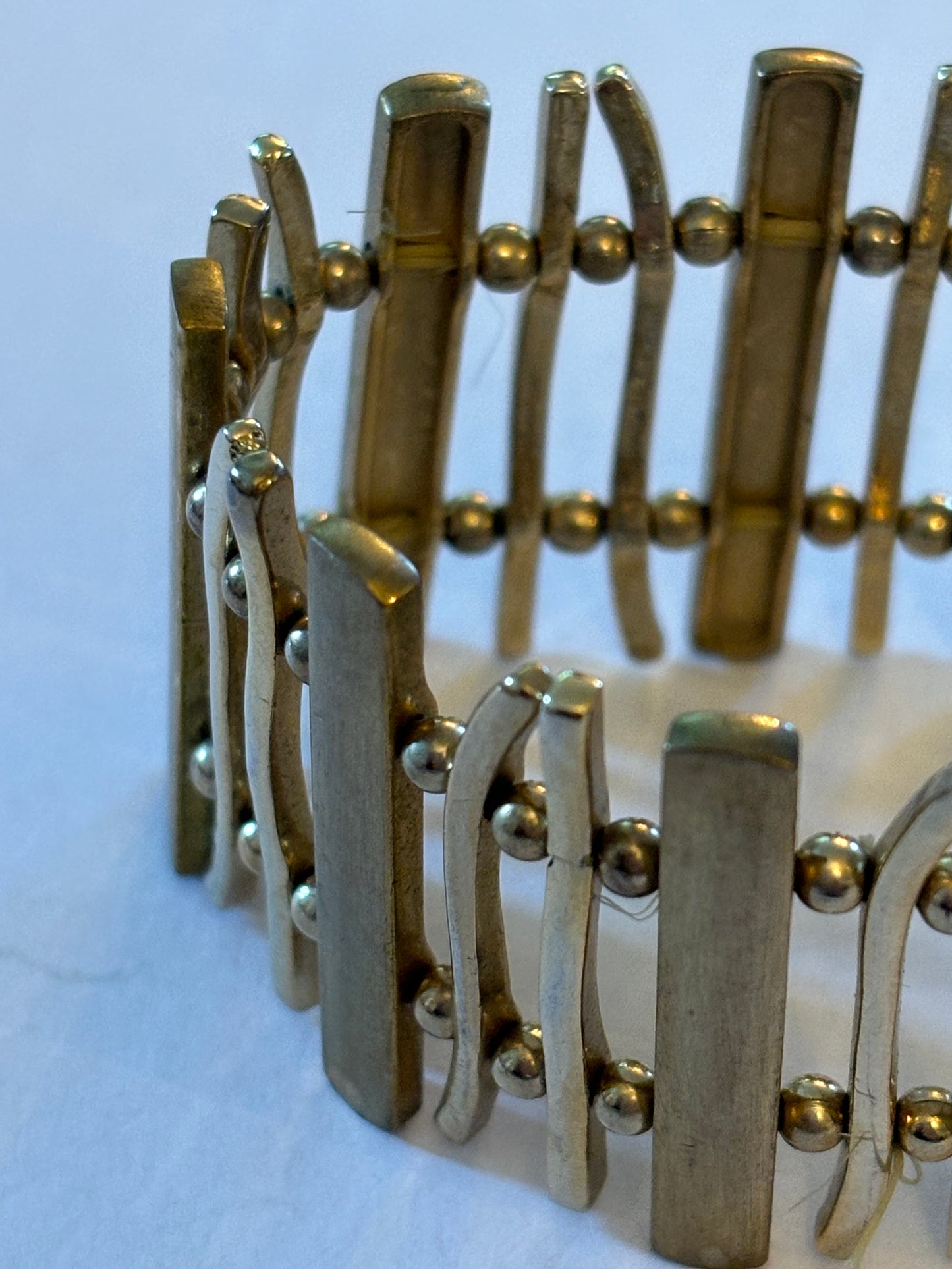 Gold metal bars and blocks stretch bracelet