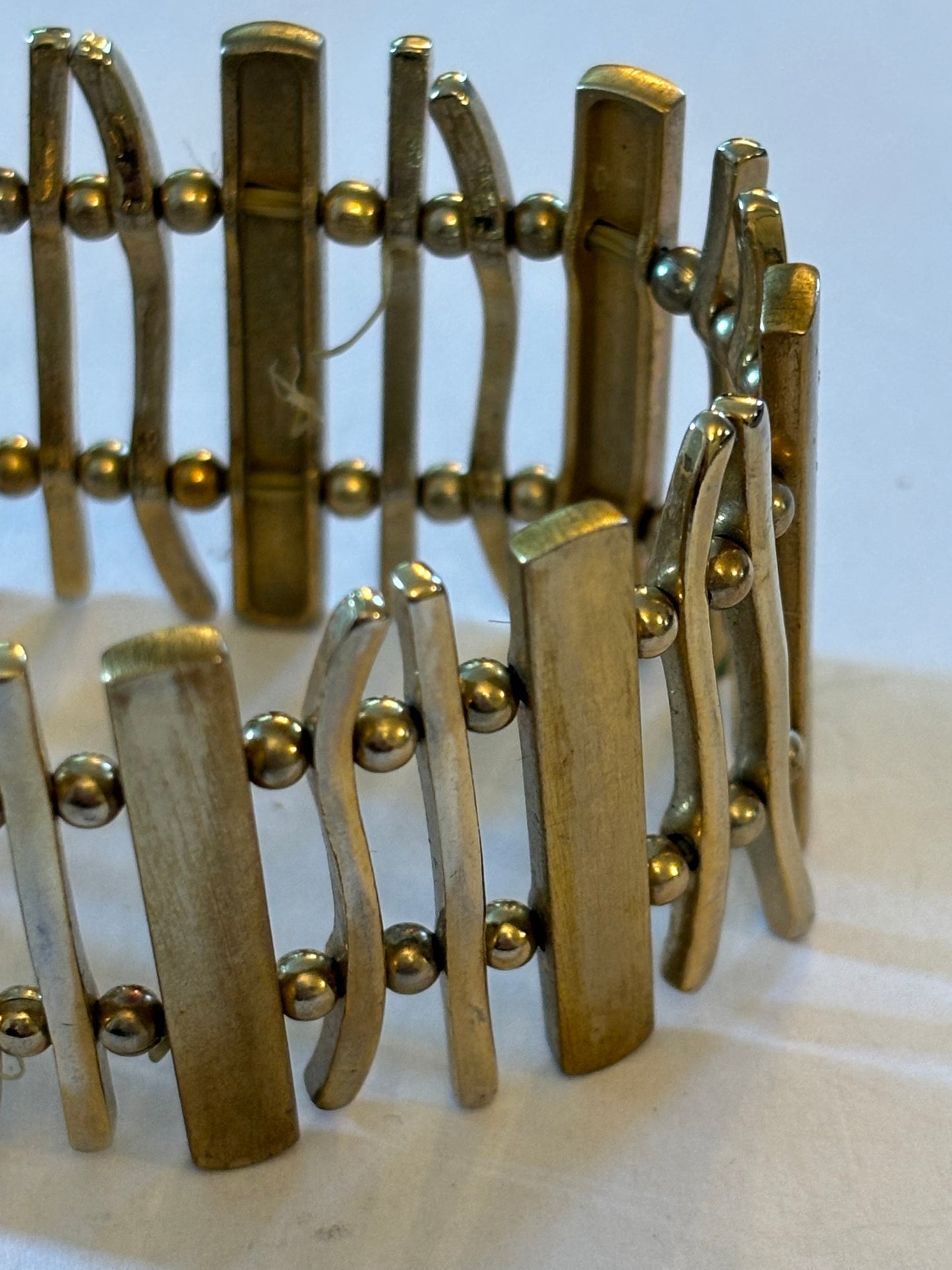 Gold metal bars and blocks stretch bracelet