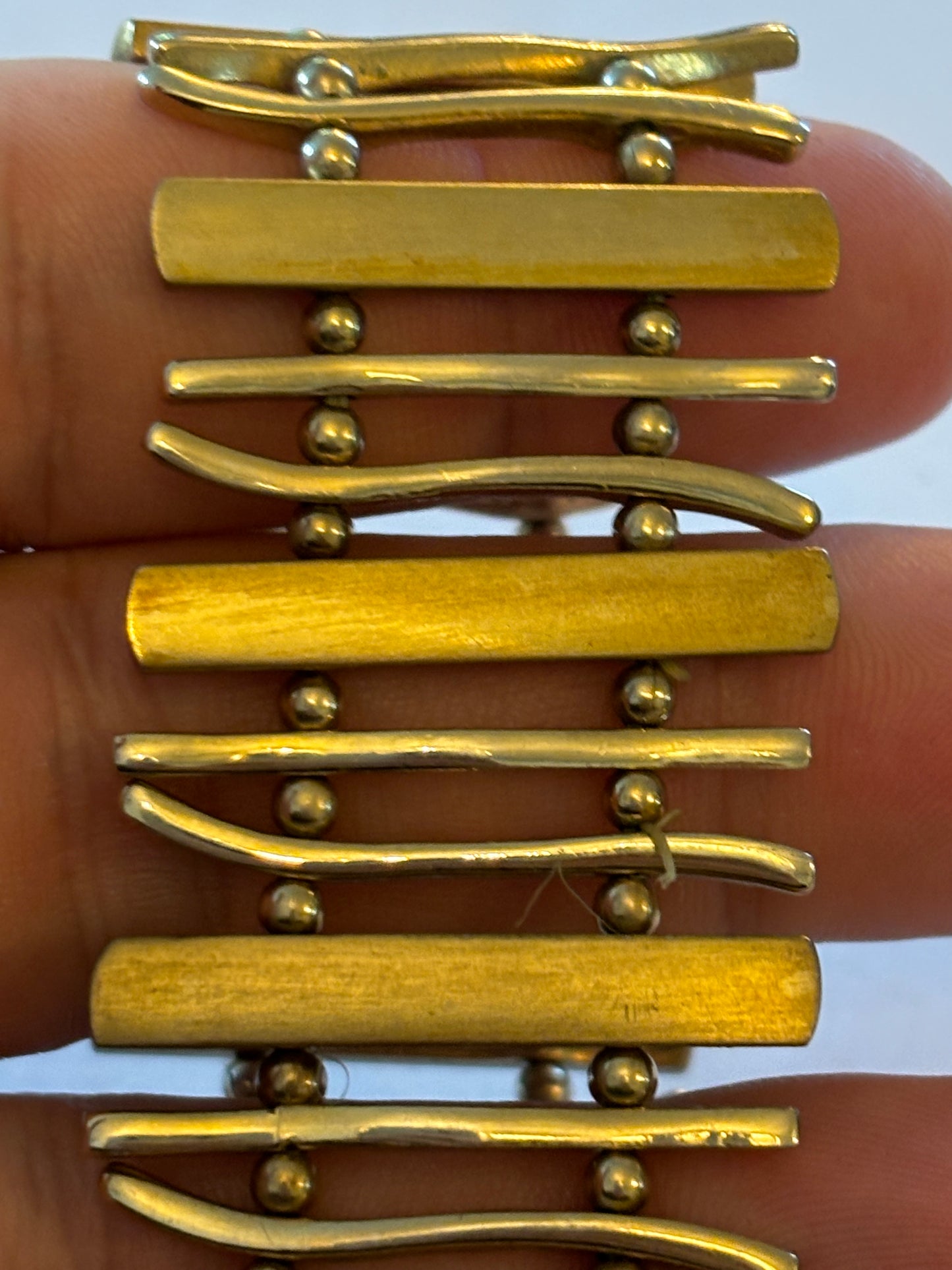 Gold metal bars and blocks stretch bracelet