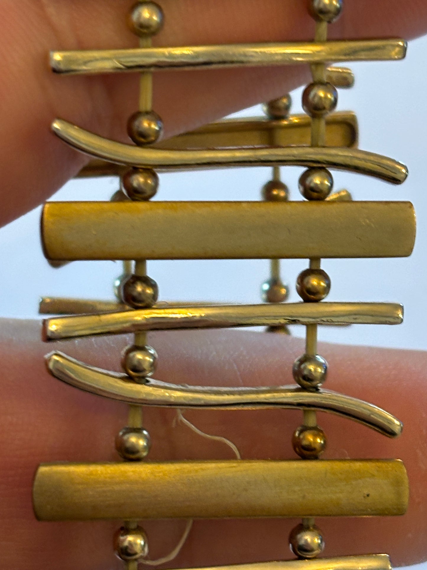 Gold metal bars and blocks stretch bracelet