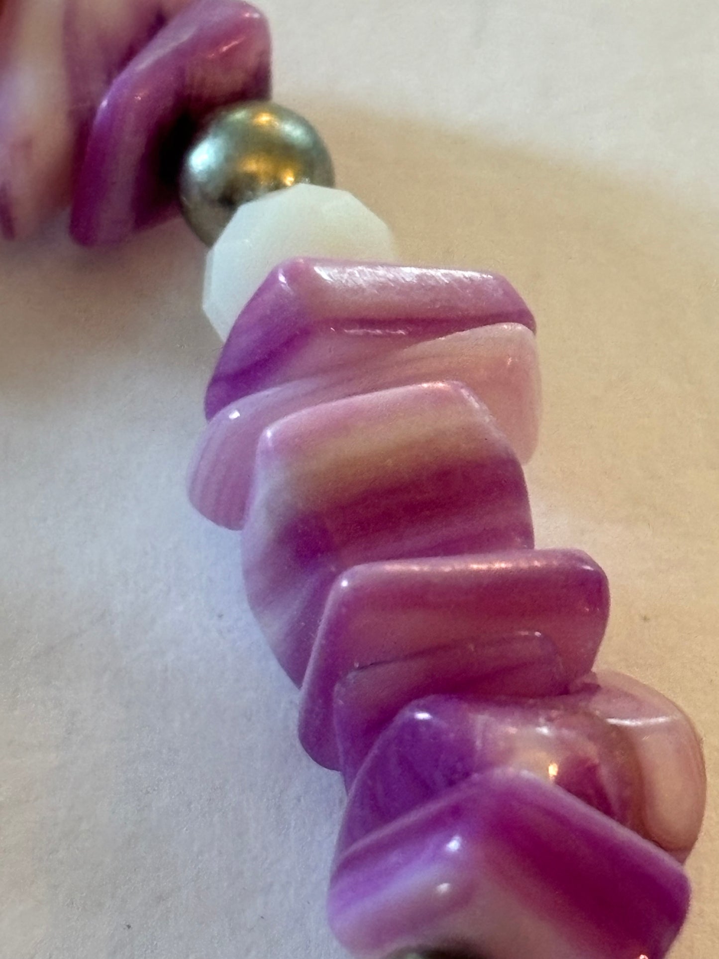 Purple and white uneven bead bracelet