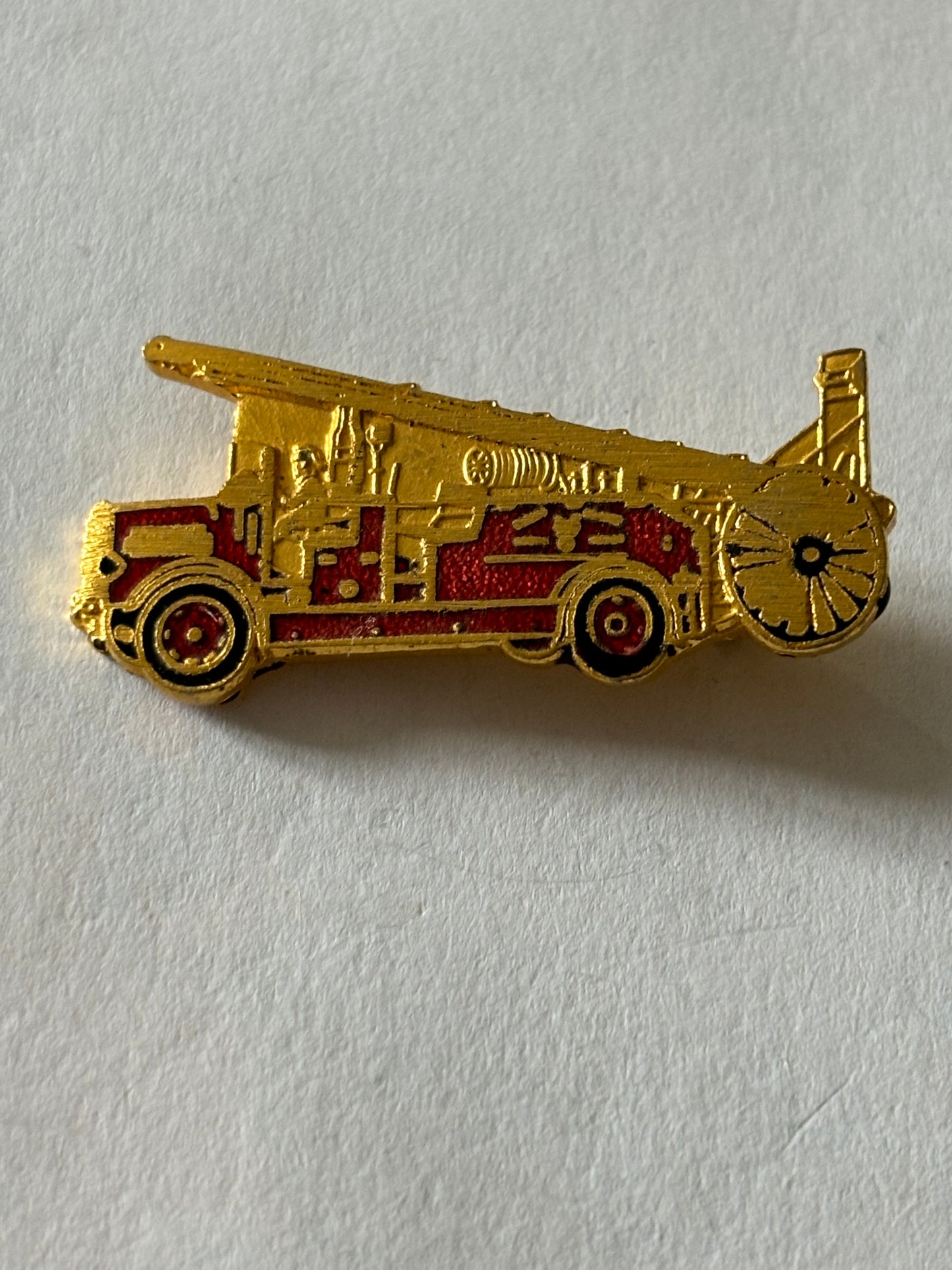 Fire Engine gold metal badge