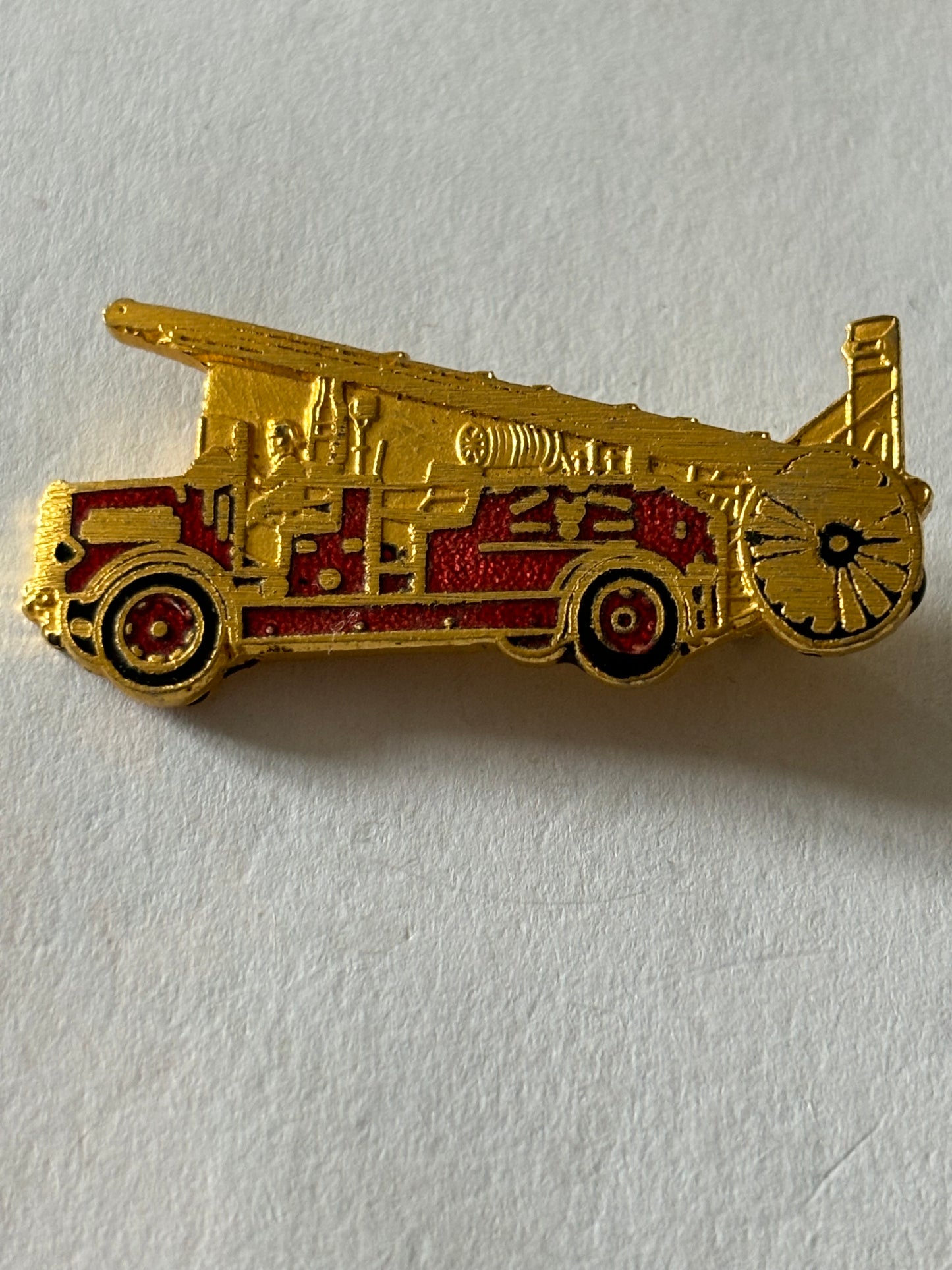 Fire Engine gold metal badge