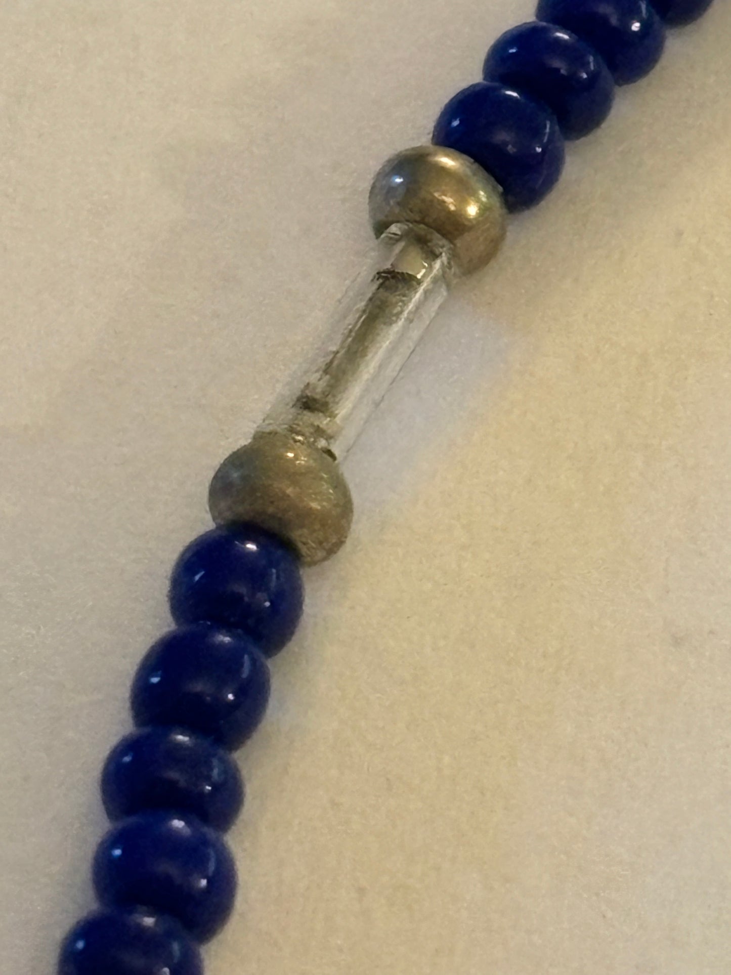 Tiny blue bead bracelet