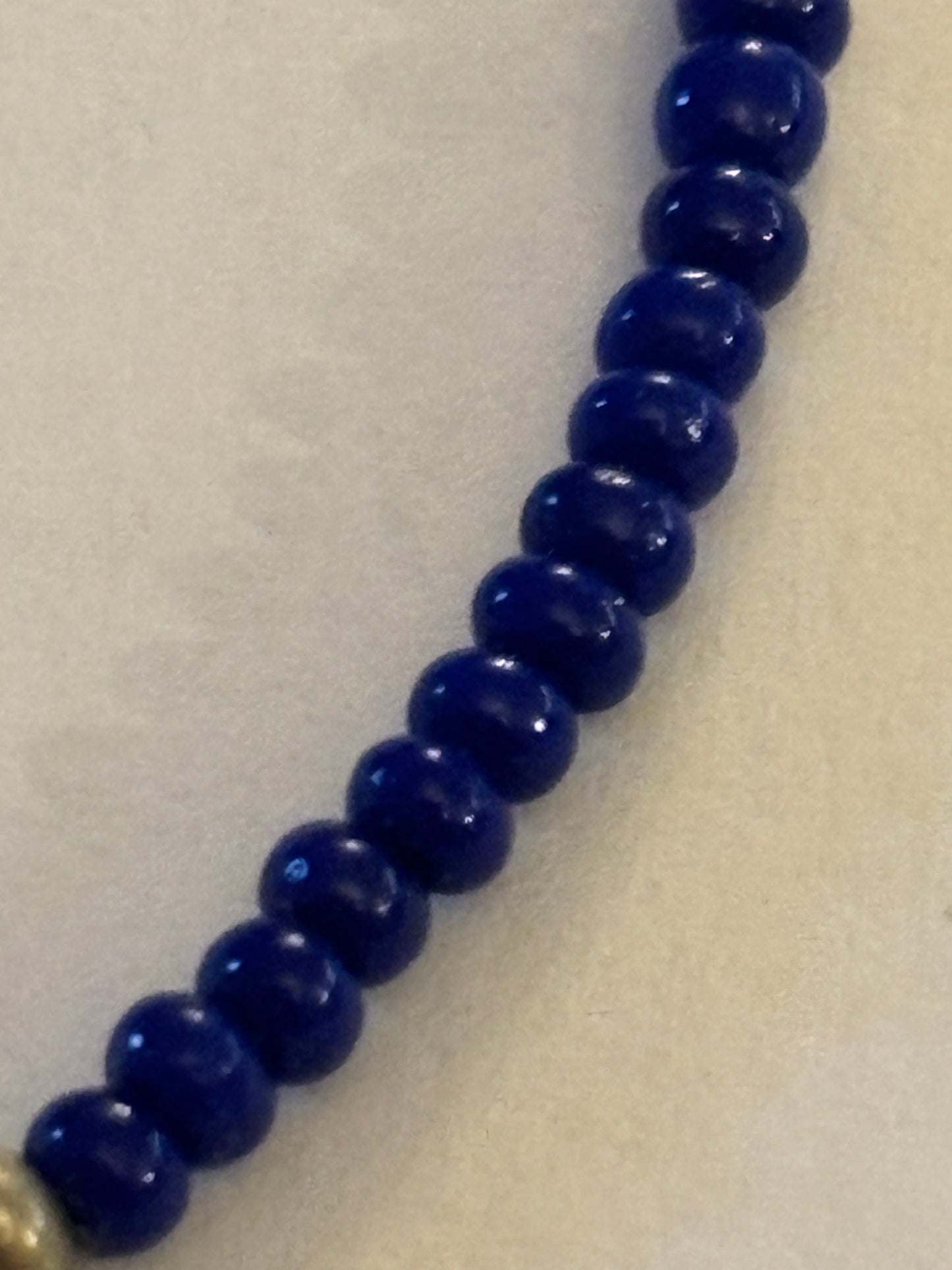 Tiny blue bead bracelet