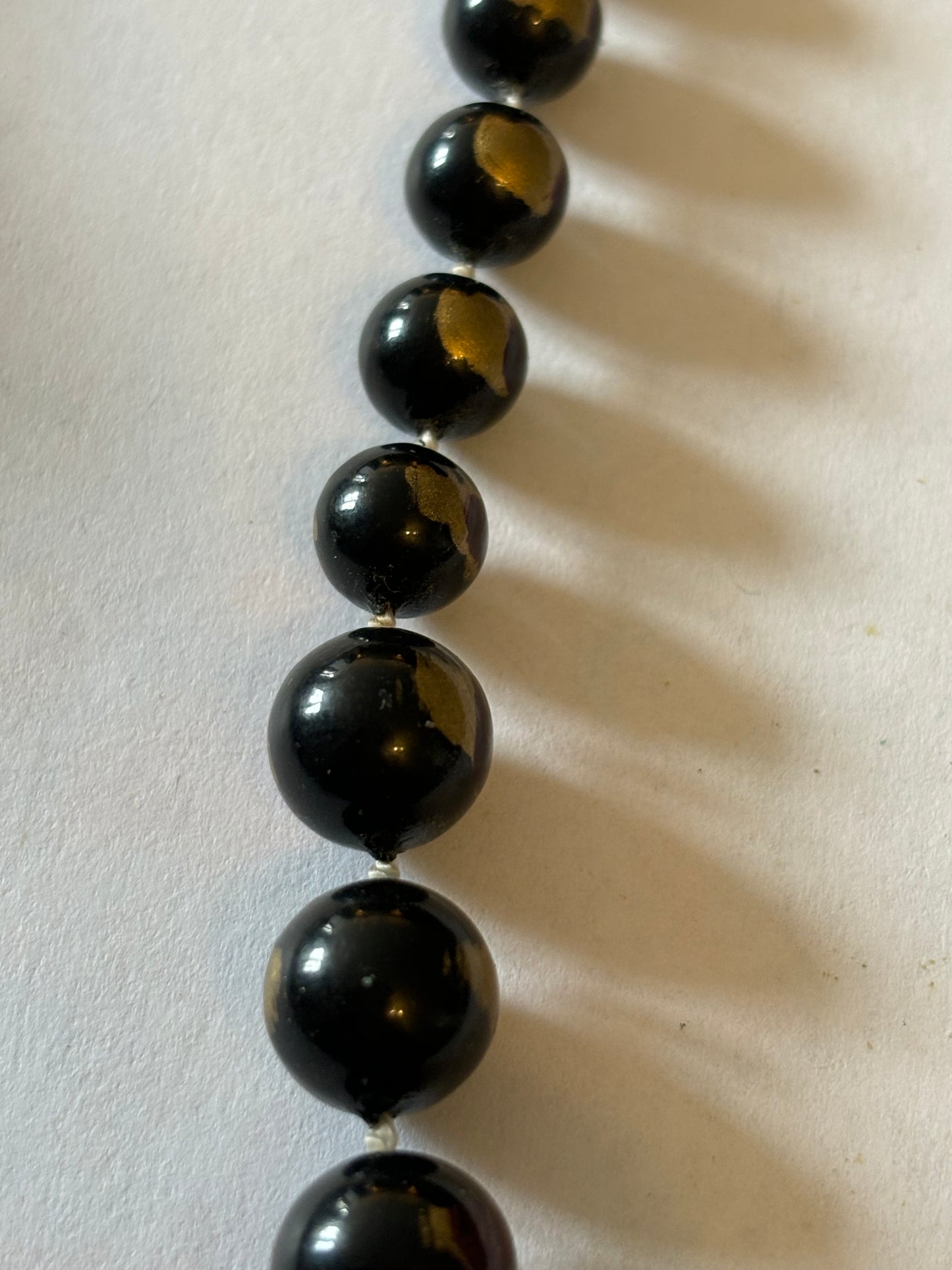 Marbled Black Slightly Graduated Bead Necklace