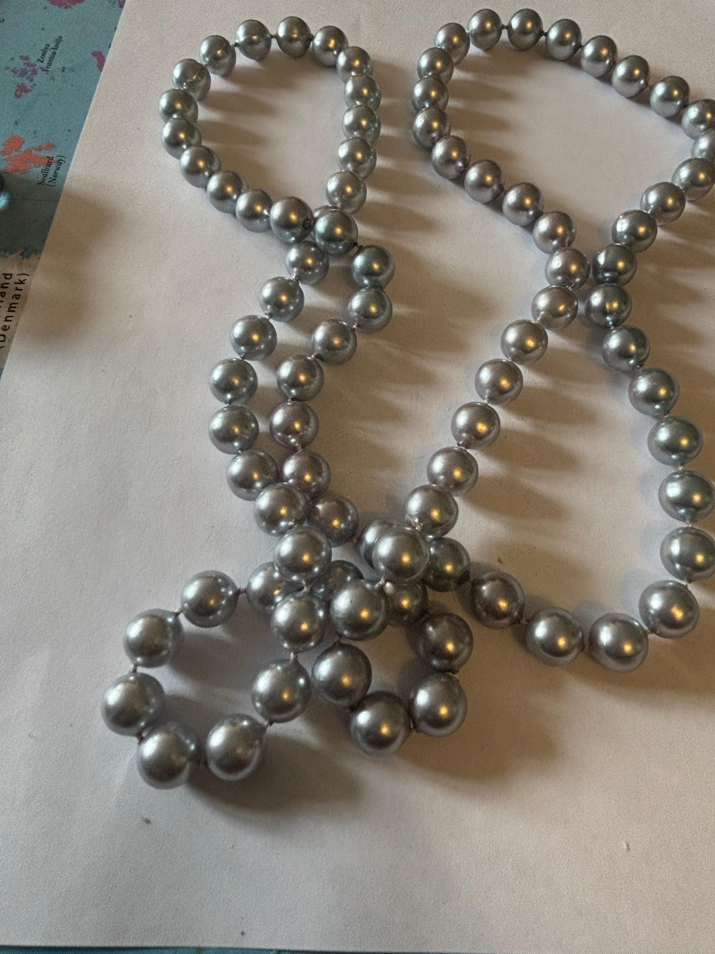 Long silver bead necklace