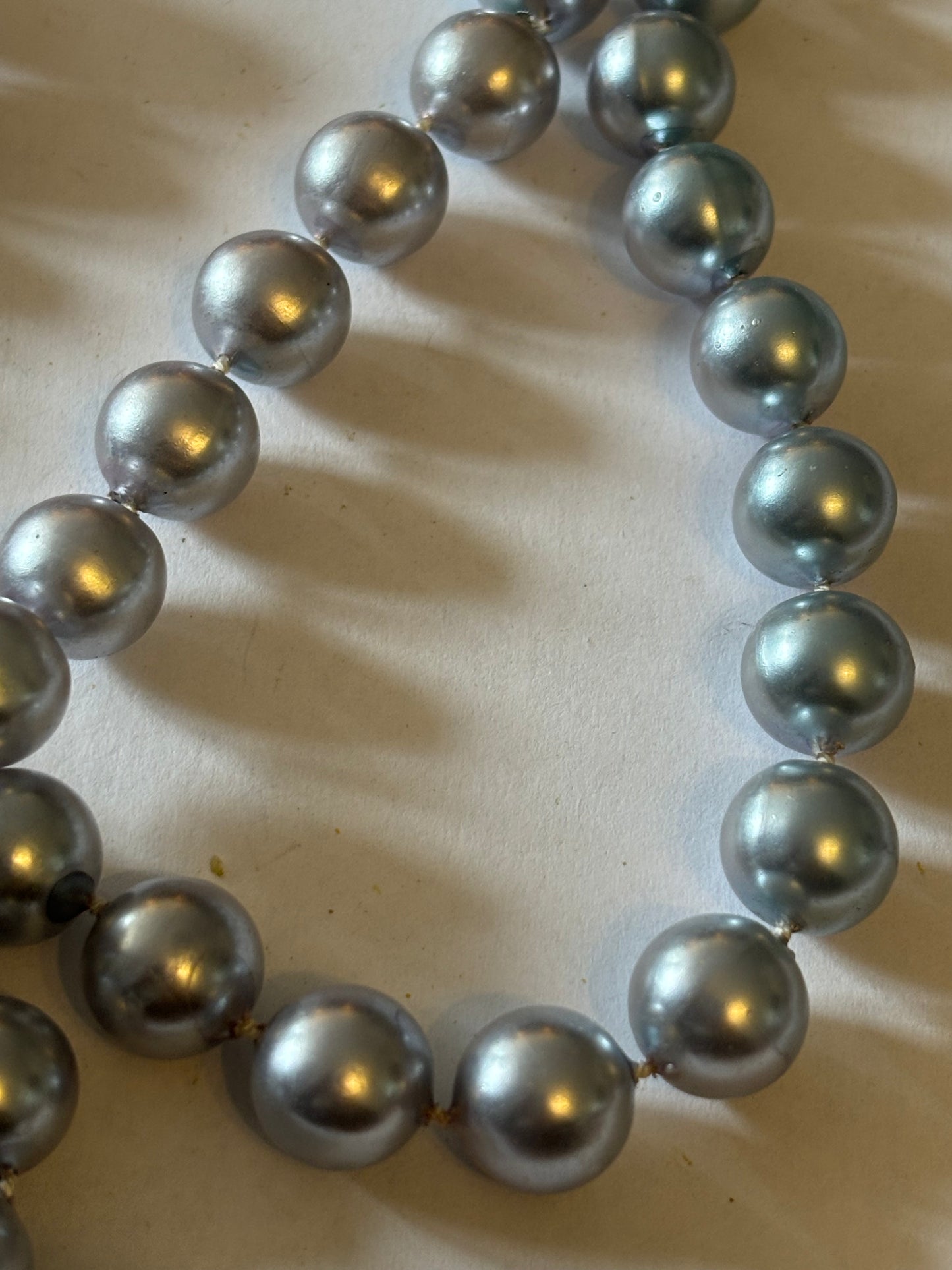 Long silver bead necklace