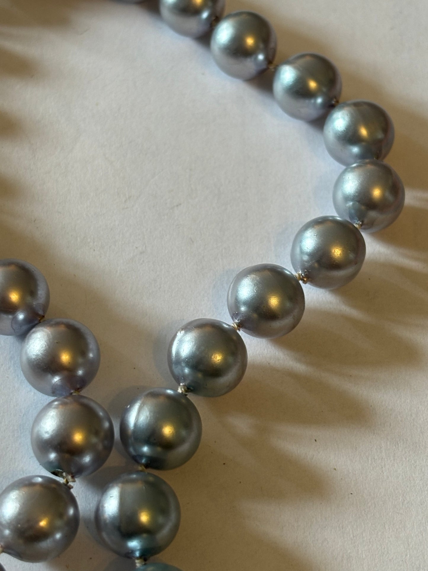 Long silver bead necklace