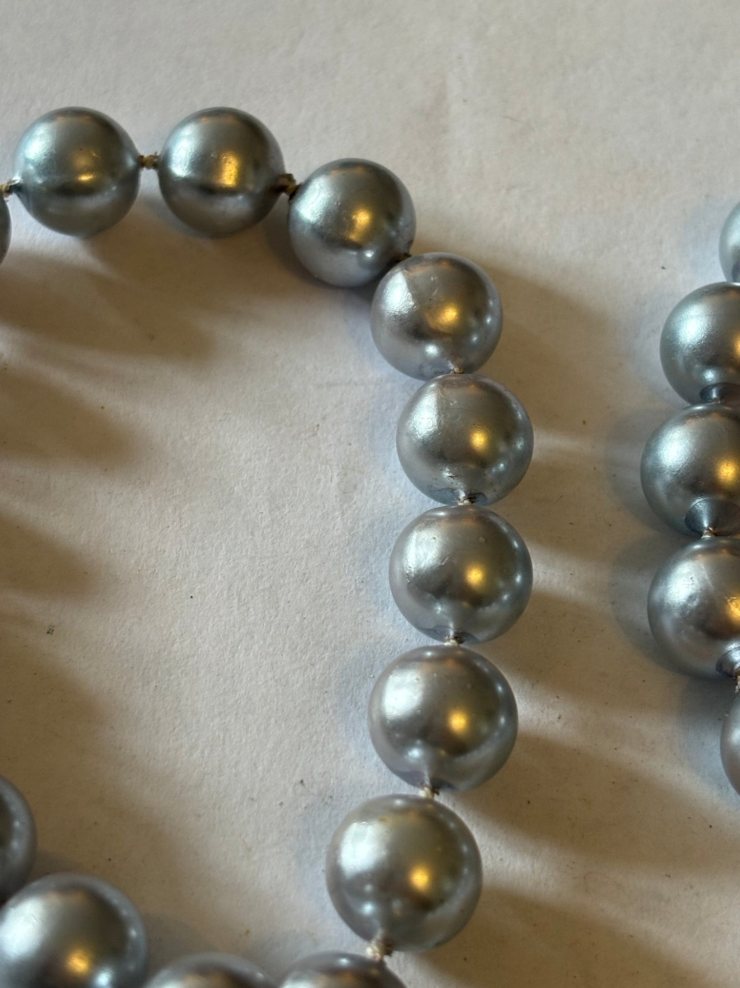 Long silver bead necklace