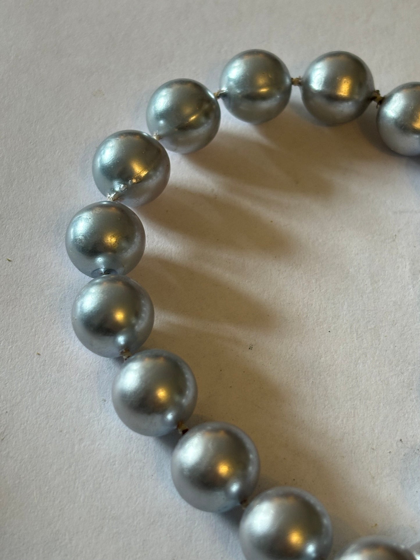 Long silver bead necklace