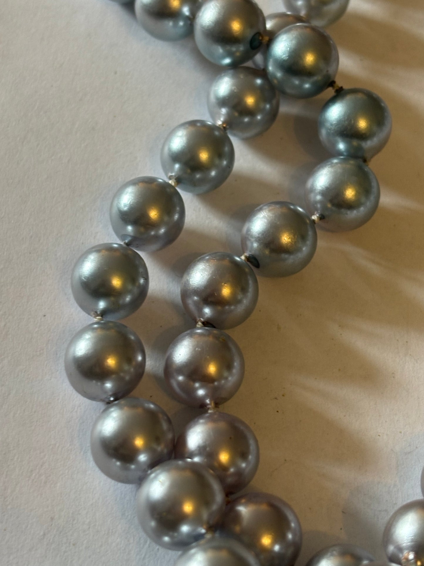 Long silver bead necklace