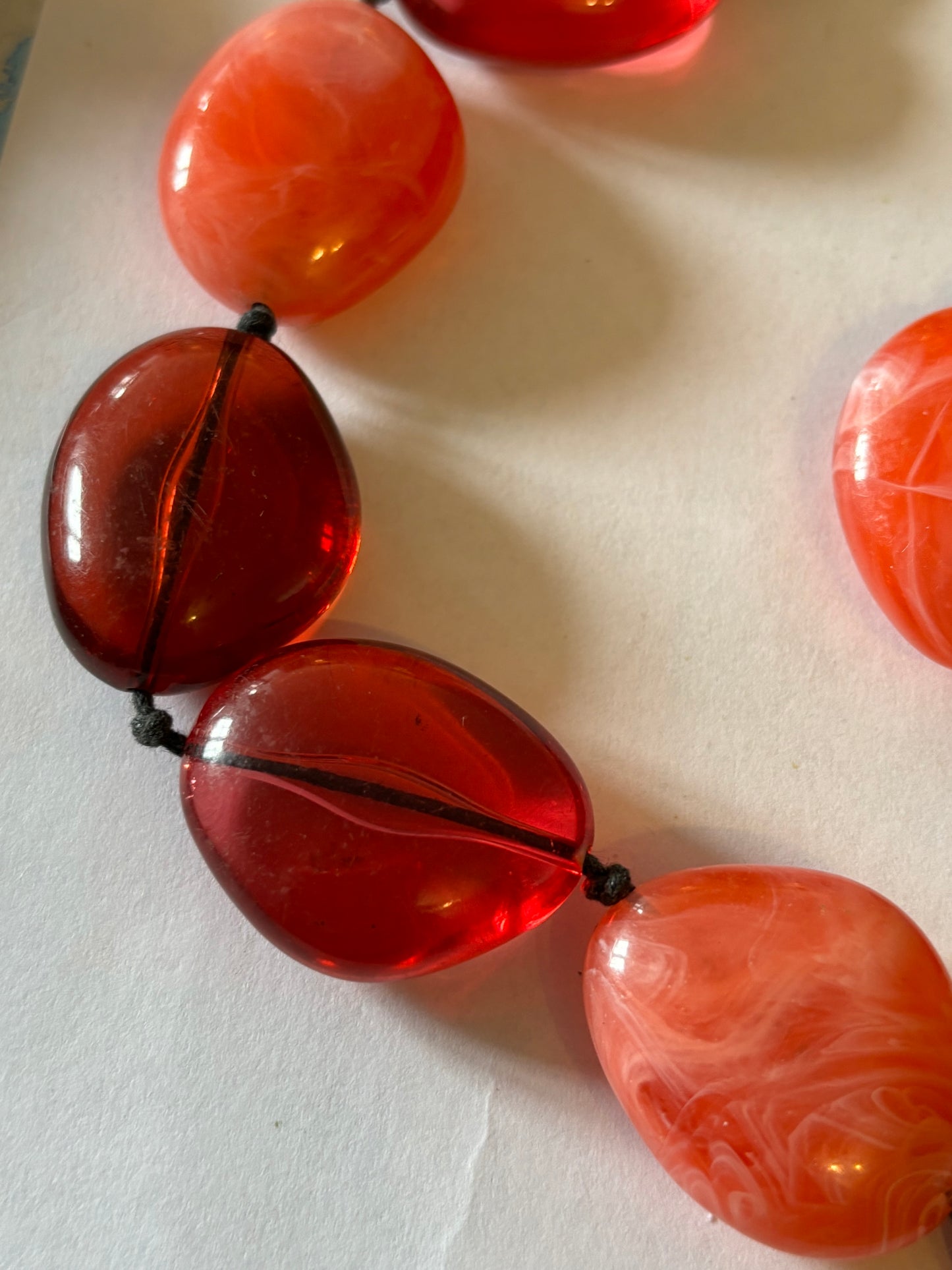 Red and Pink Swirl Beaded Necklace on Double Black String