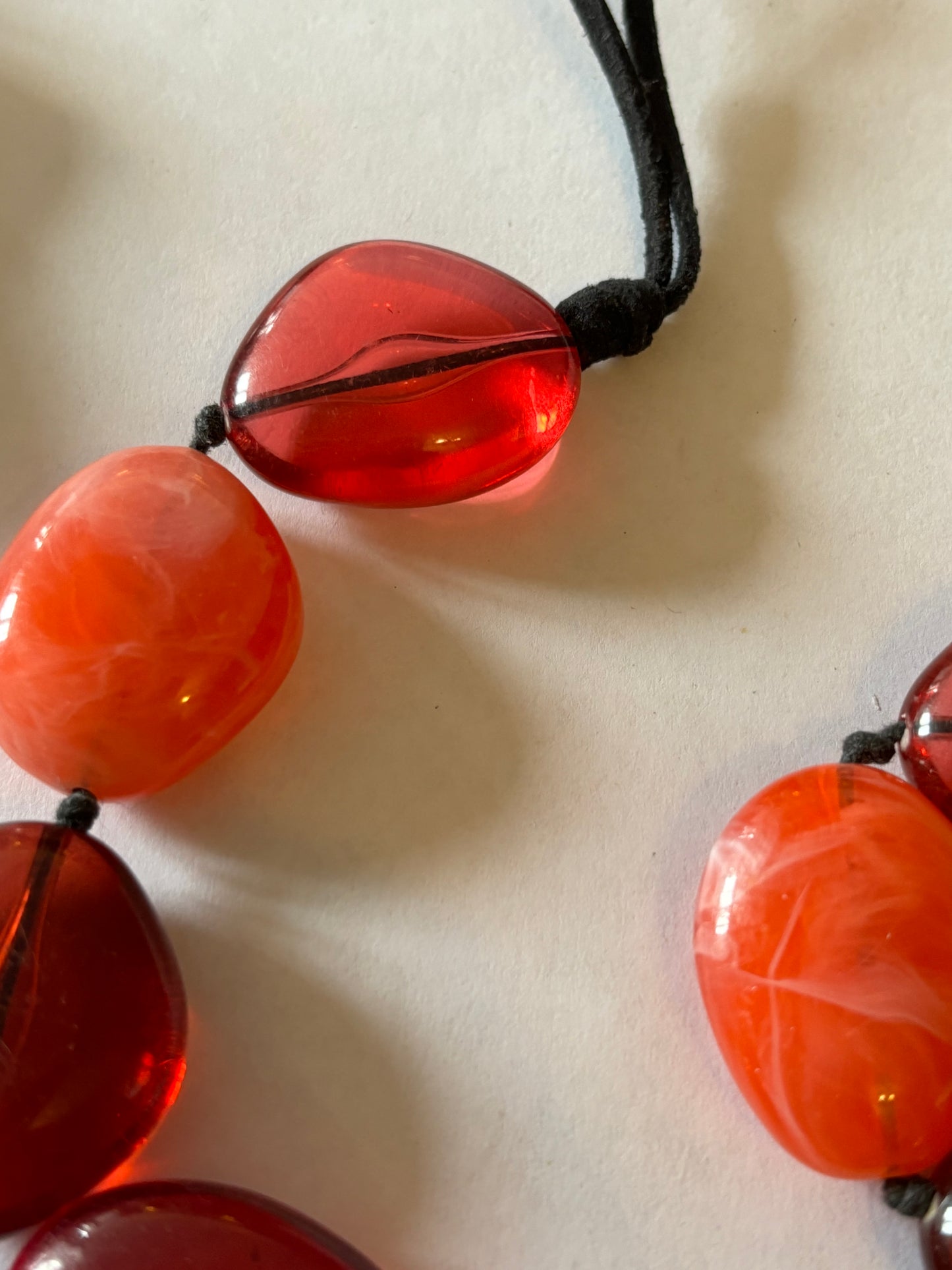 Red and Pink Swirl Beaded Necklace on Double Black String