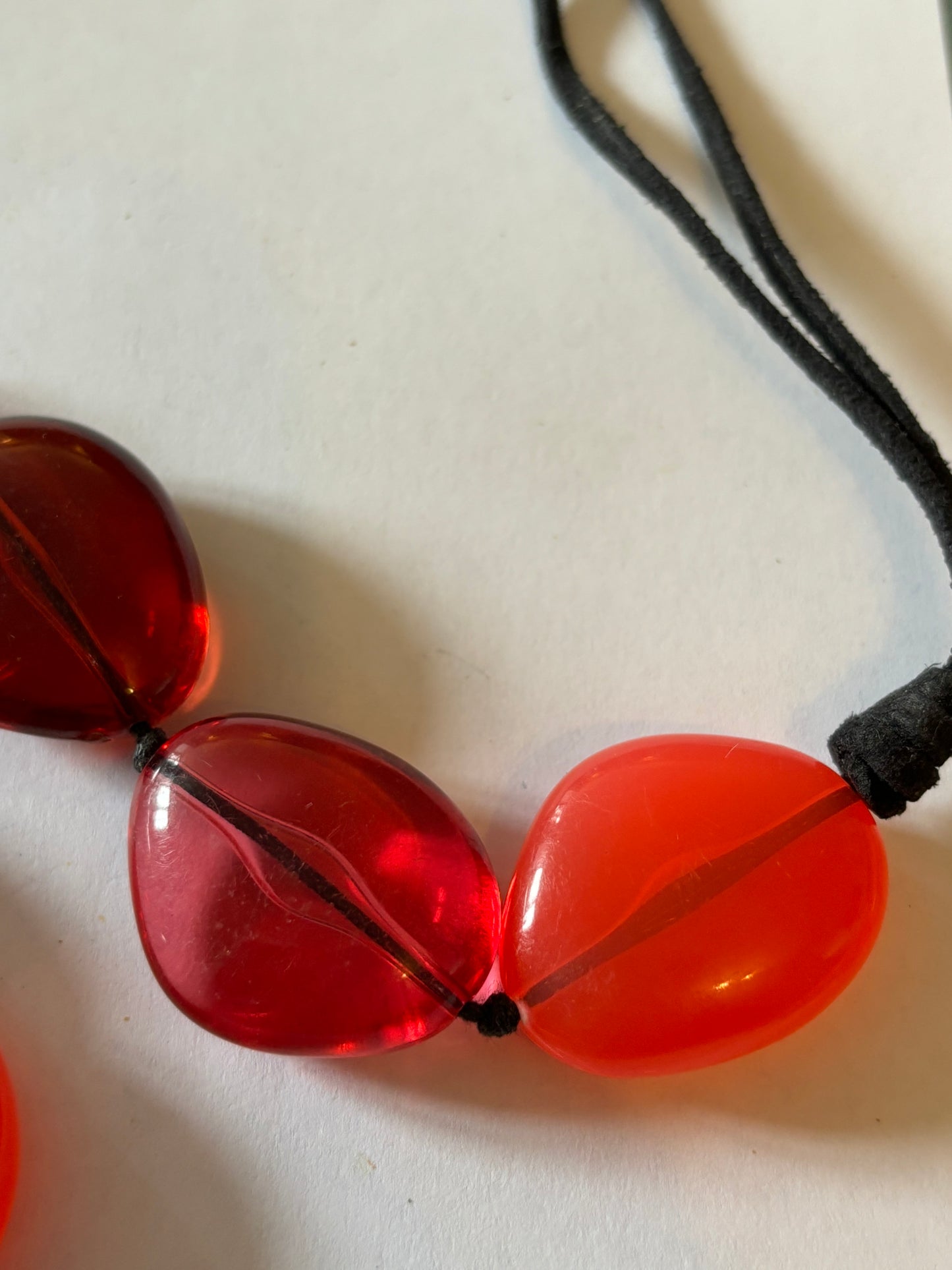 Red and Pink Swirl Beaded Necklace on Double Black String