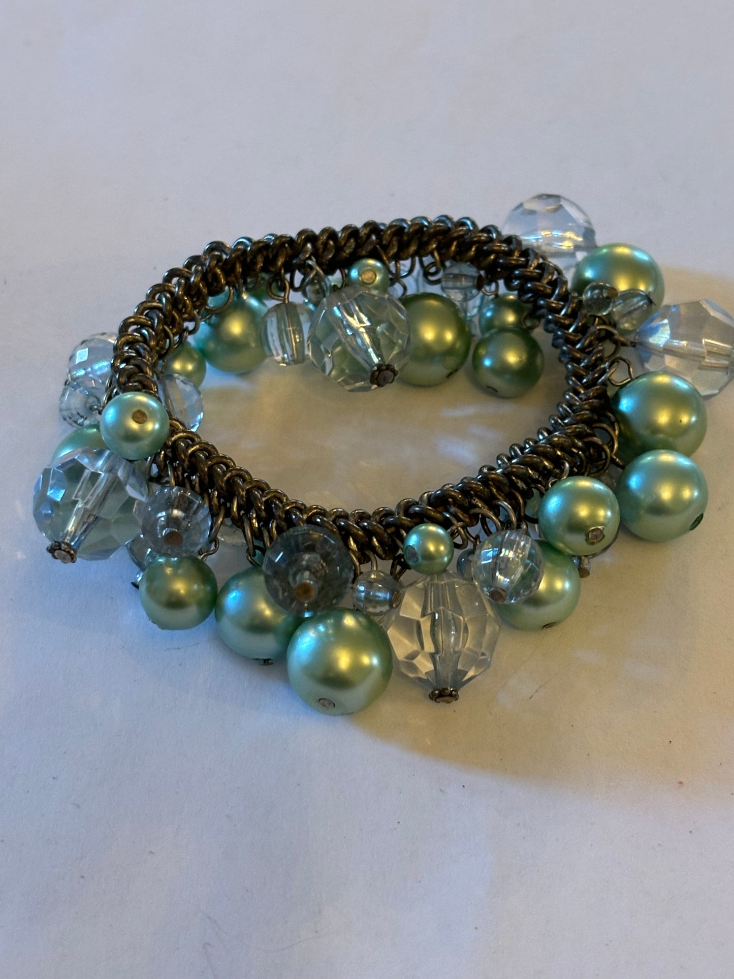 Light metallic green bead cluster bracelet