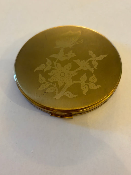 Vintage Vanity Fair round gold metal powder compact