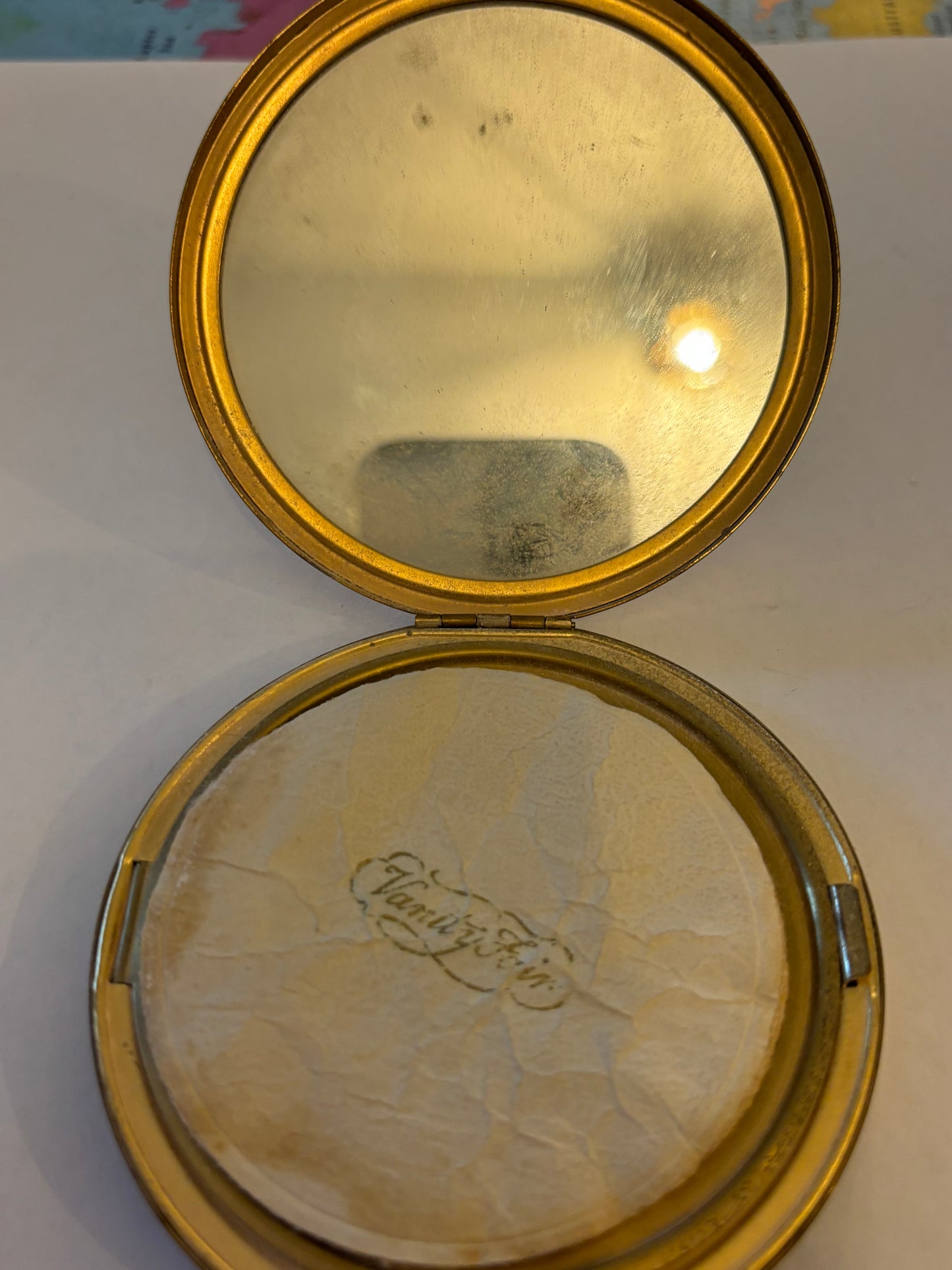 Vintage Vanity Fair round gold metal powder compact