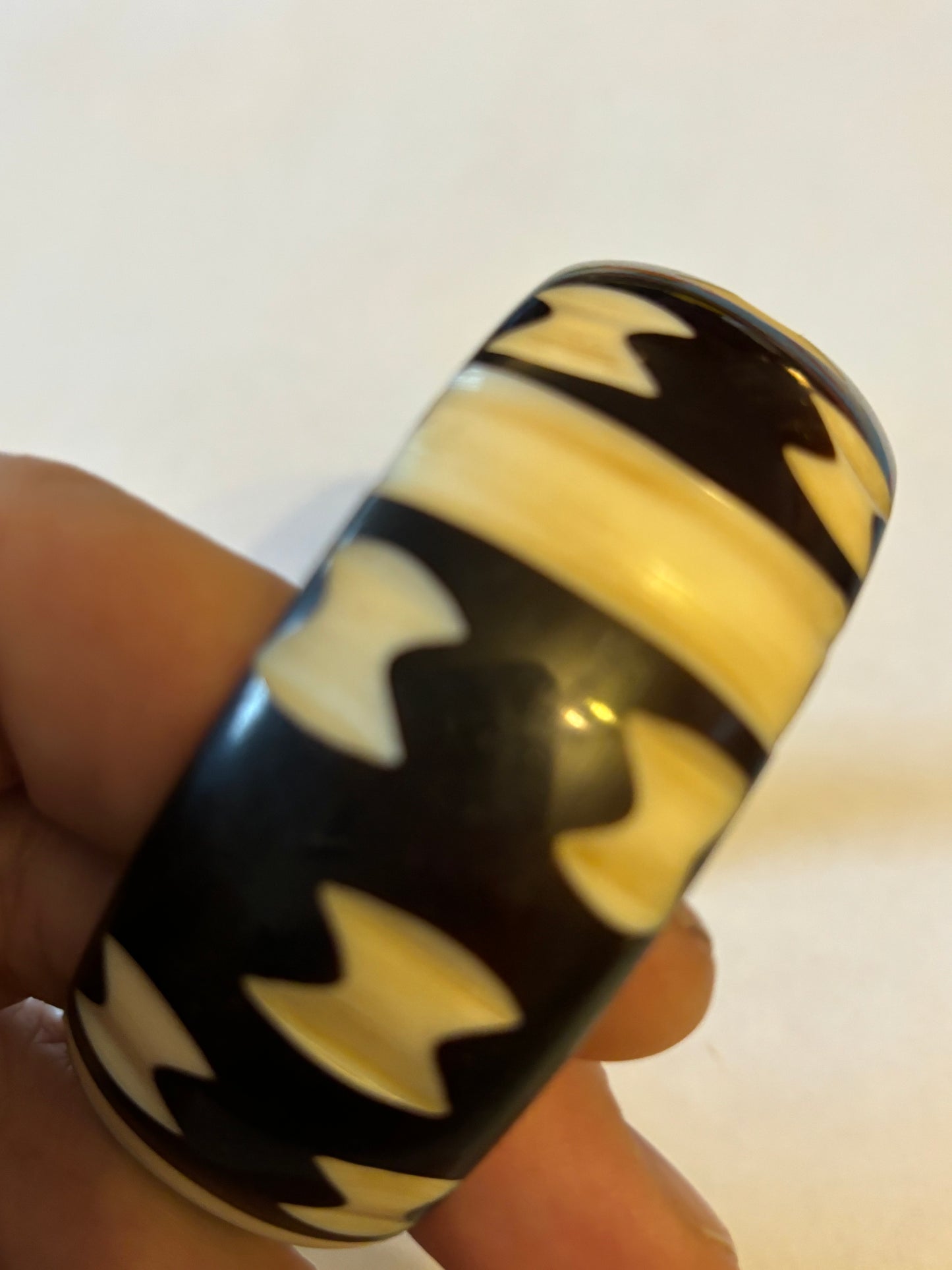 Black Bangle with White Bow Pattern