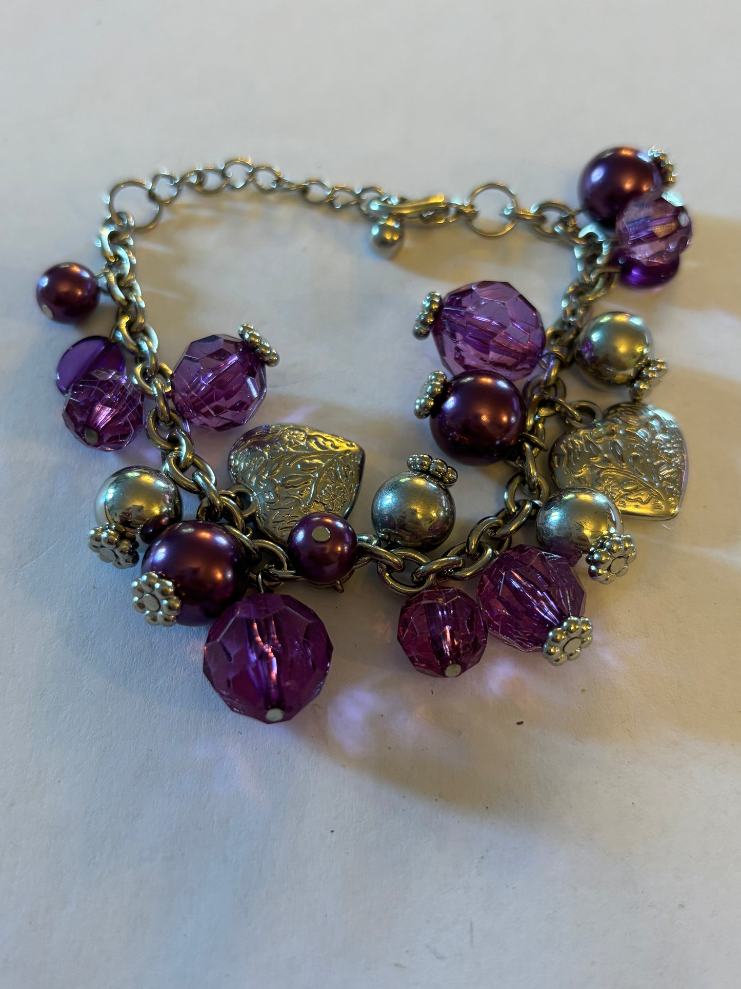 Purple and silver beads and hearts bracelet