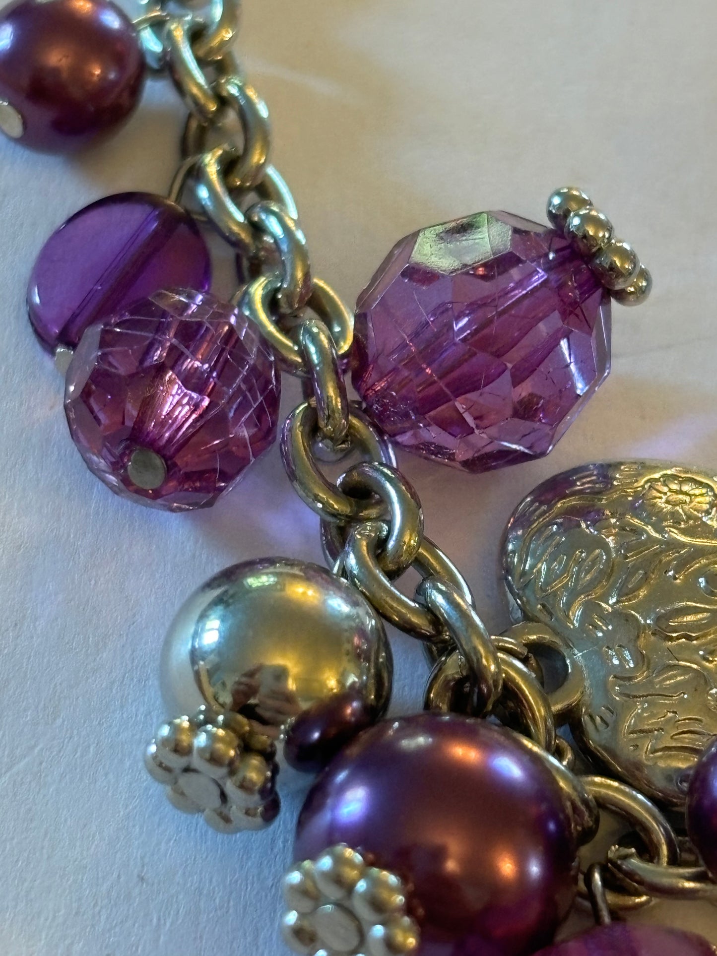 Purple and silver beads and hearts bracelet