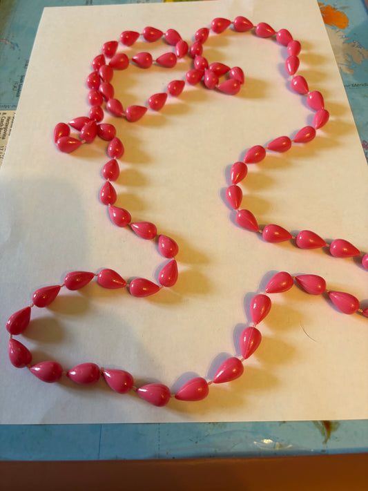 Pink spinning top beaded necklace