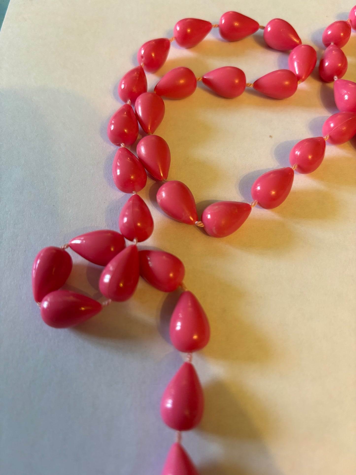 Pink spinning top beaded necklace