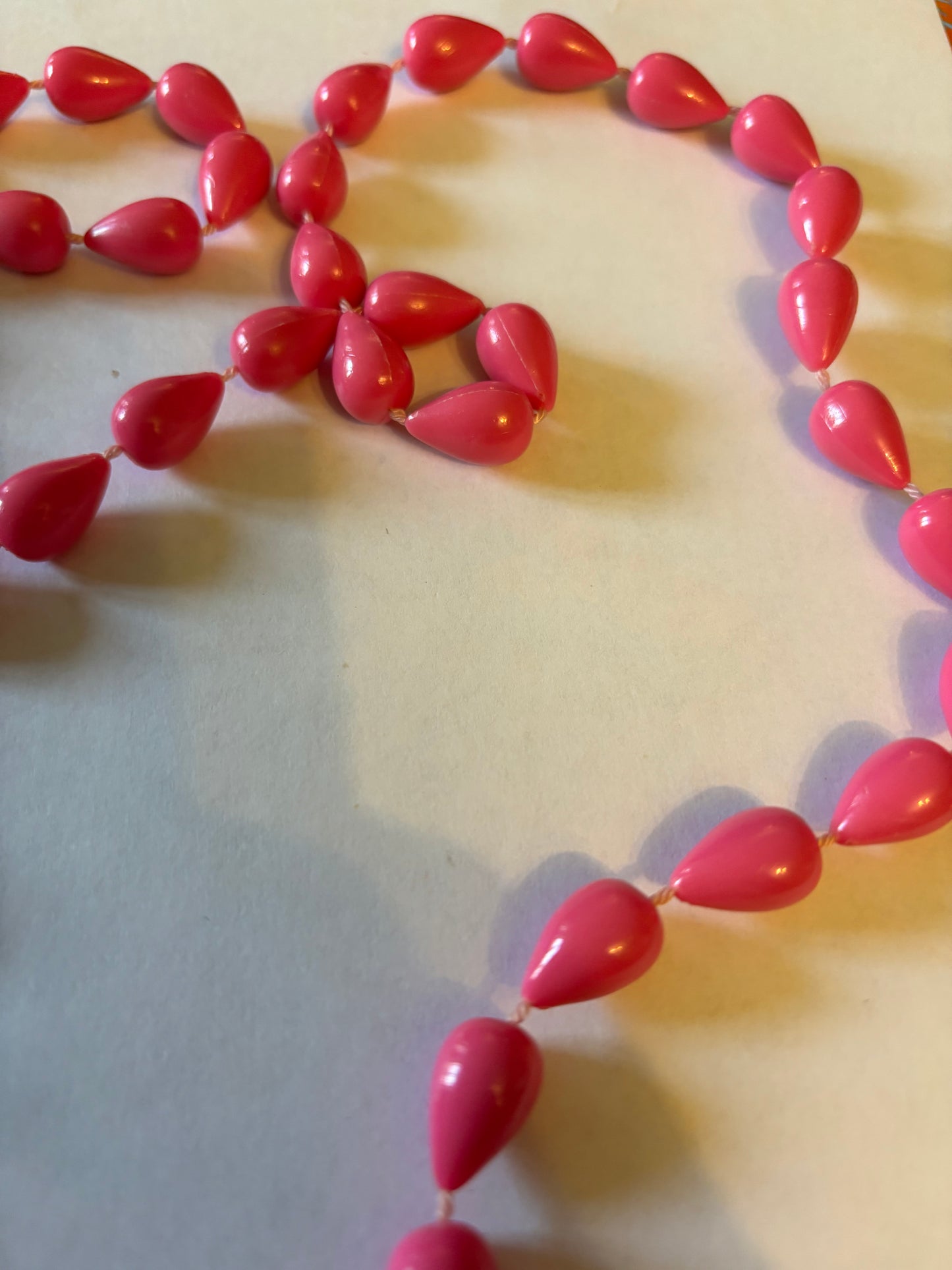 Pink spinning top beaded necklace