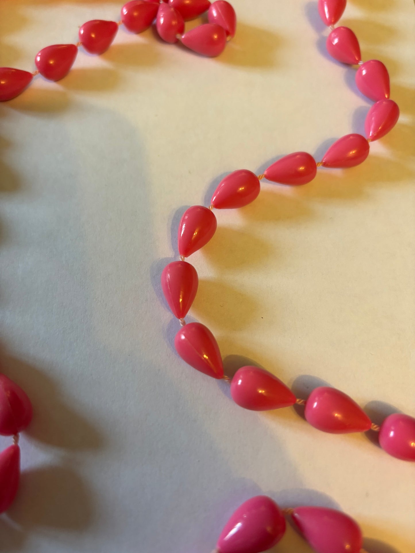 Pink spinning top beaded necklace