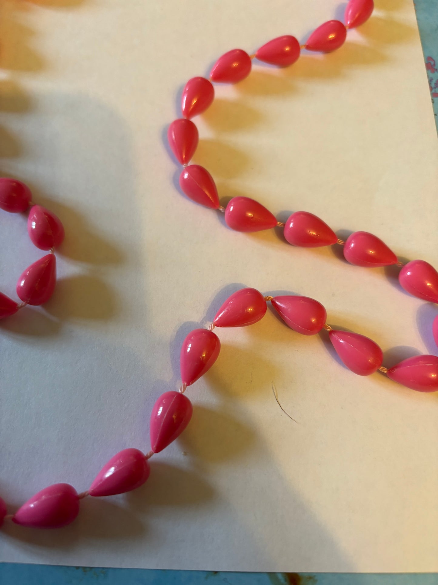 Pink spinning top beaded necklace