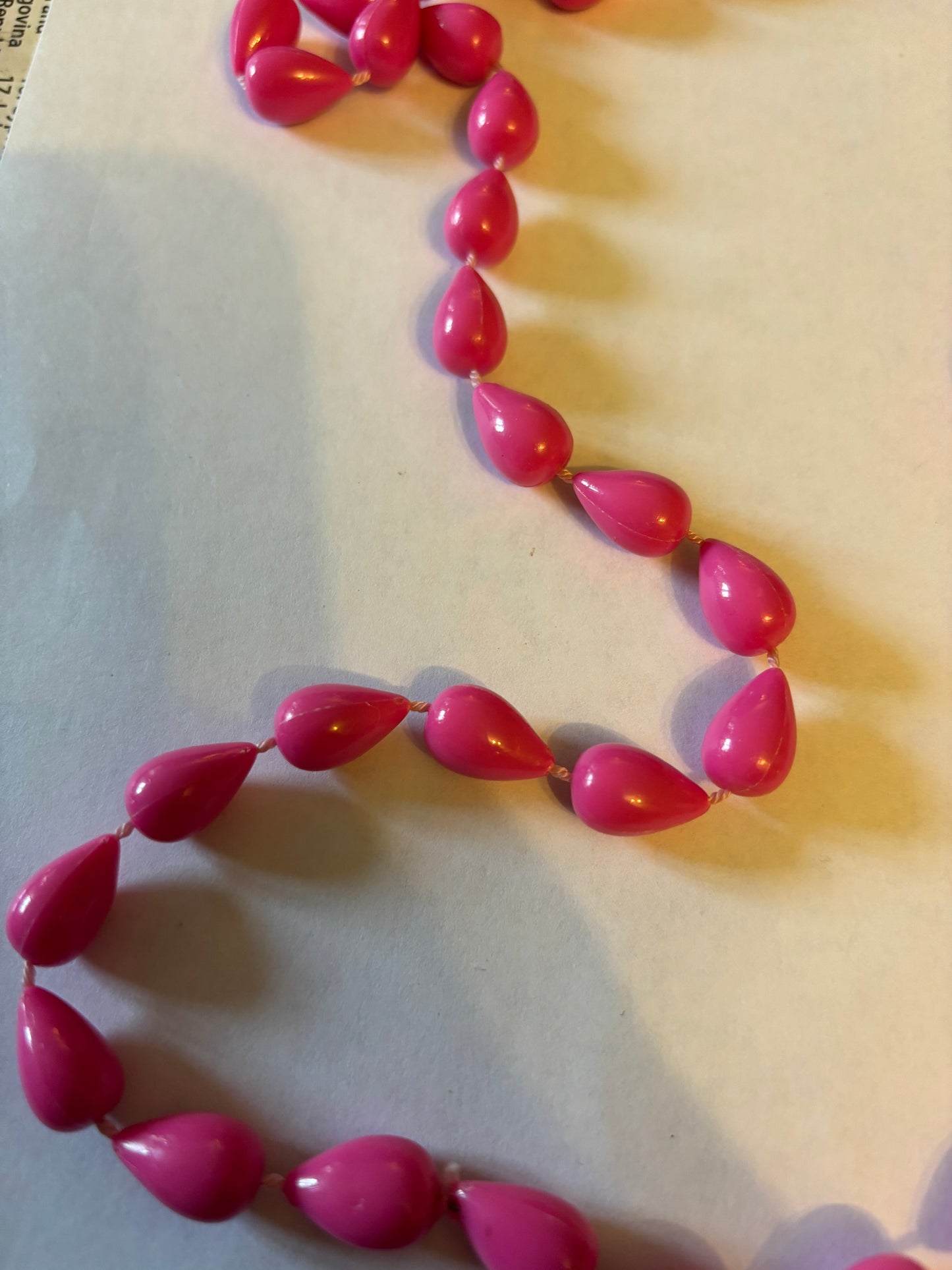 Pink spinning top beaded necklace