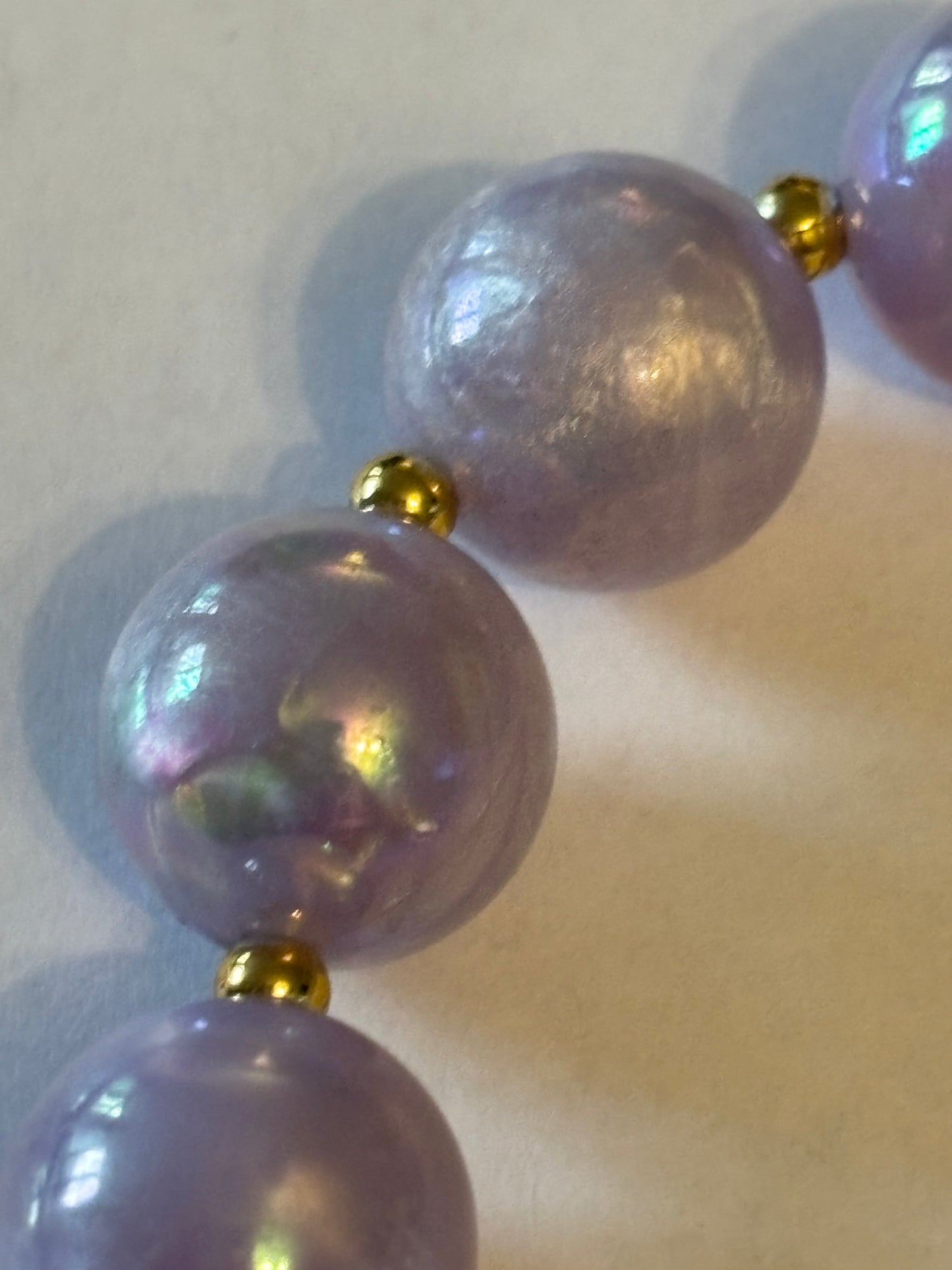 Pearlescent lilac bead necklace with small silver spacers