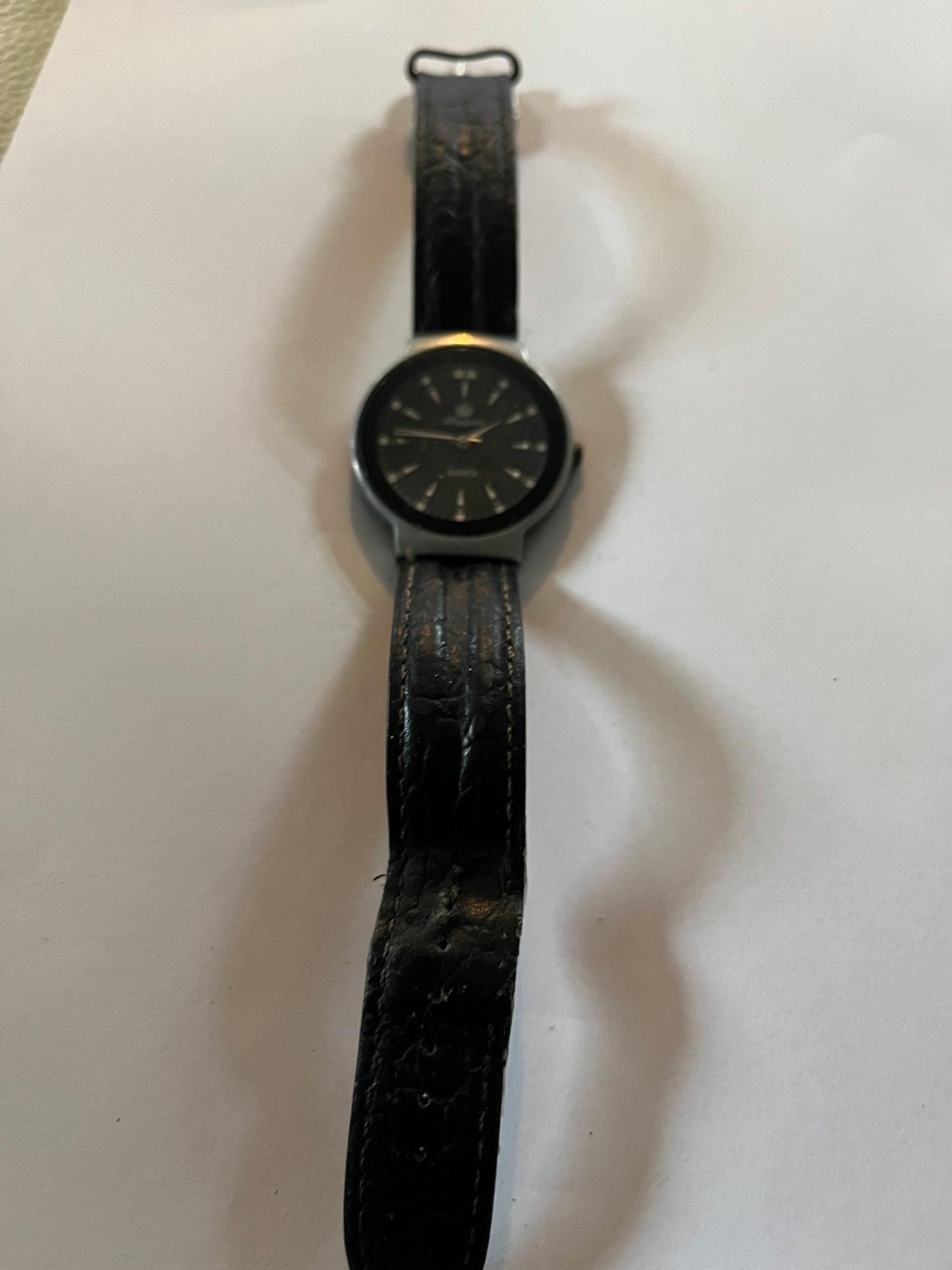 King Quartz - Black and silver wristwatch - Untested