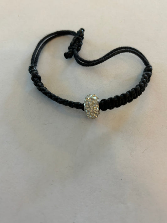 Black friendship bracelet with a single diamante bead