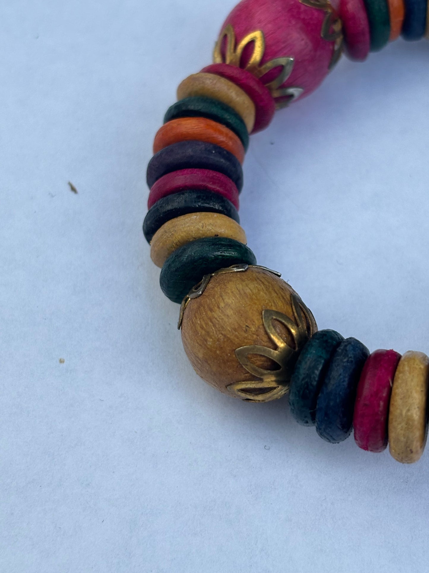 Coloured wooden disc wrap bracelet with jingle bells