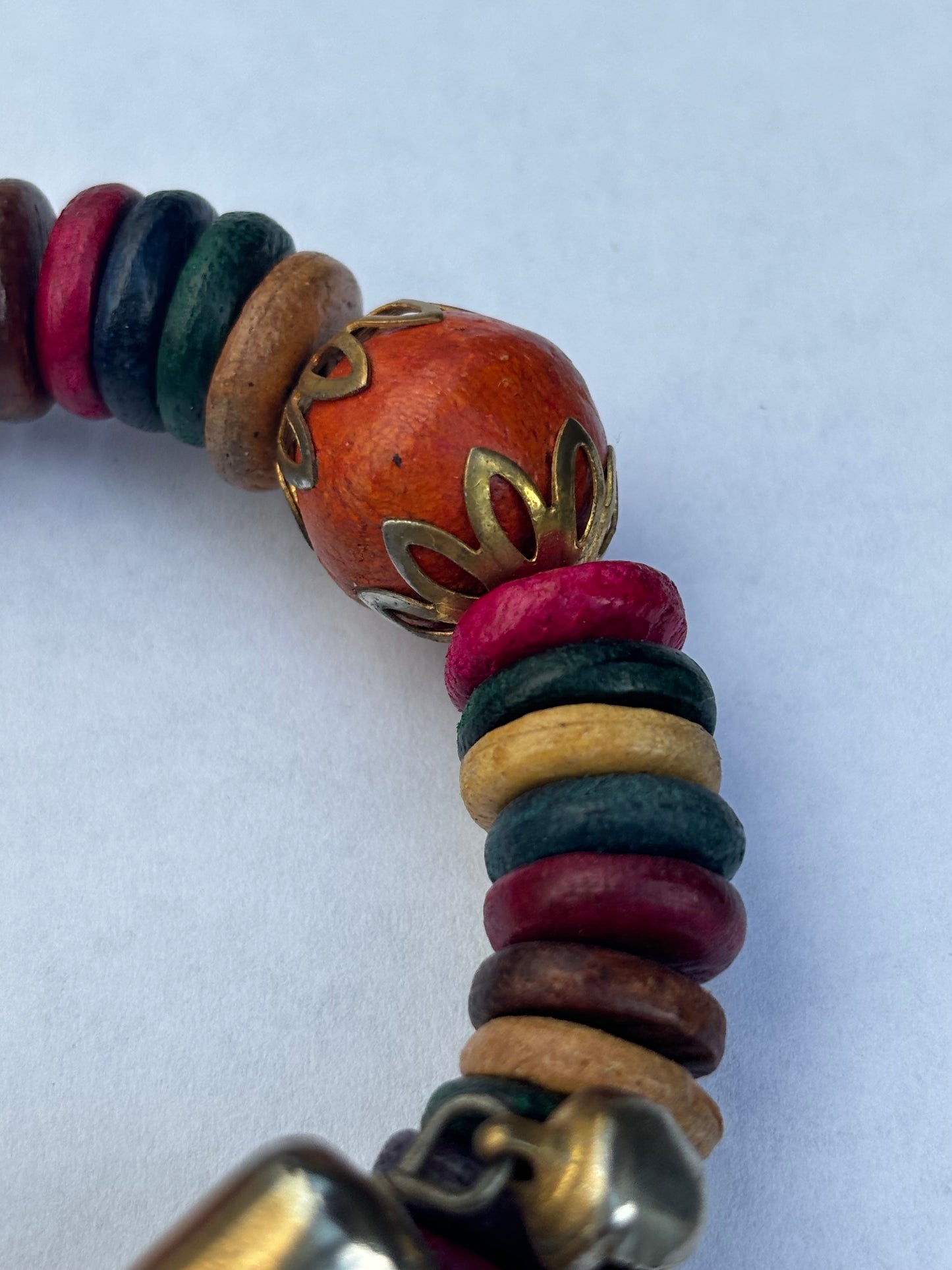 Coloured wooden disc wrap bracelet with jingle bells