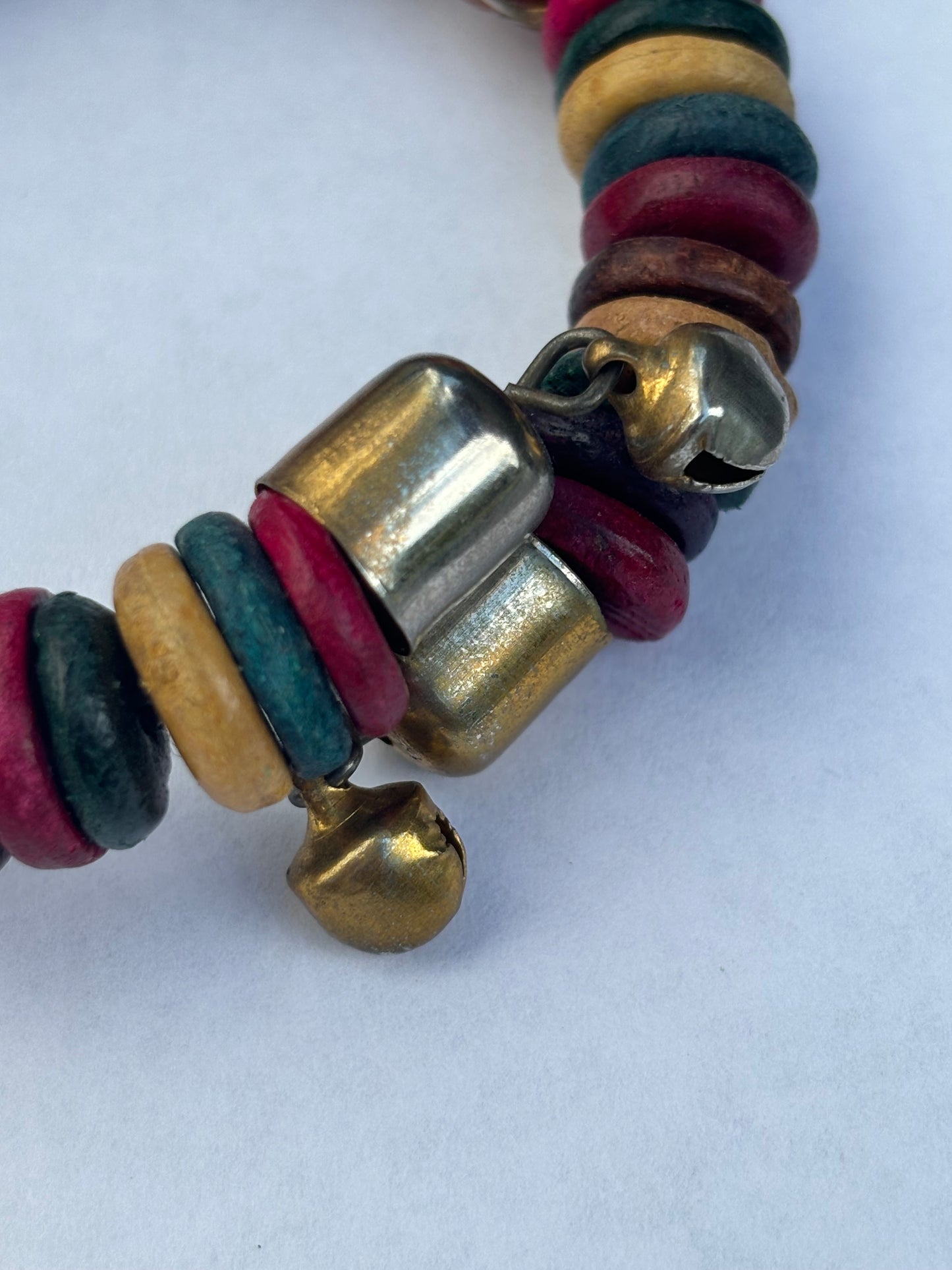 Coloured wooden disc wrap bracelet with jingle bells