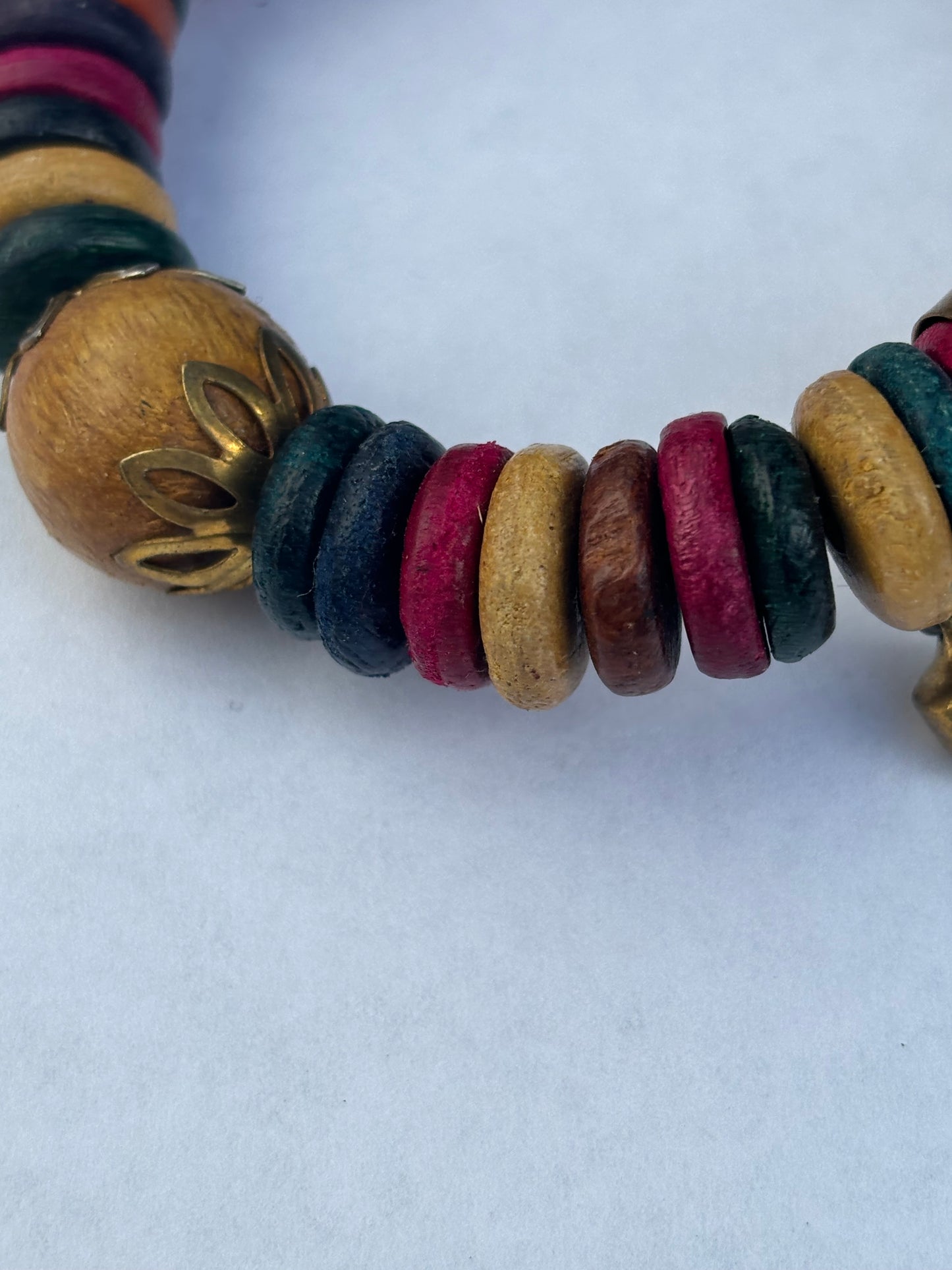 Coloured wooden disc wrap bracelet with jingle bells