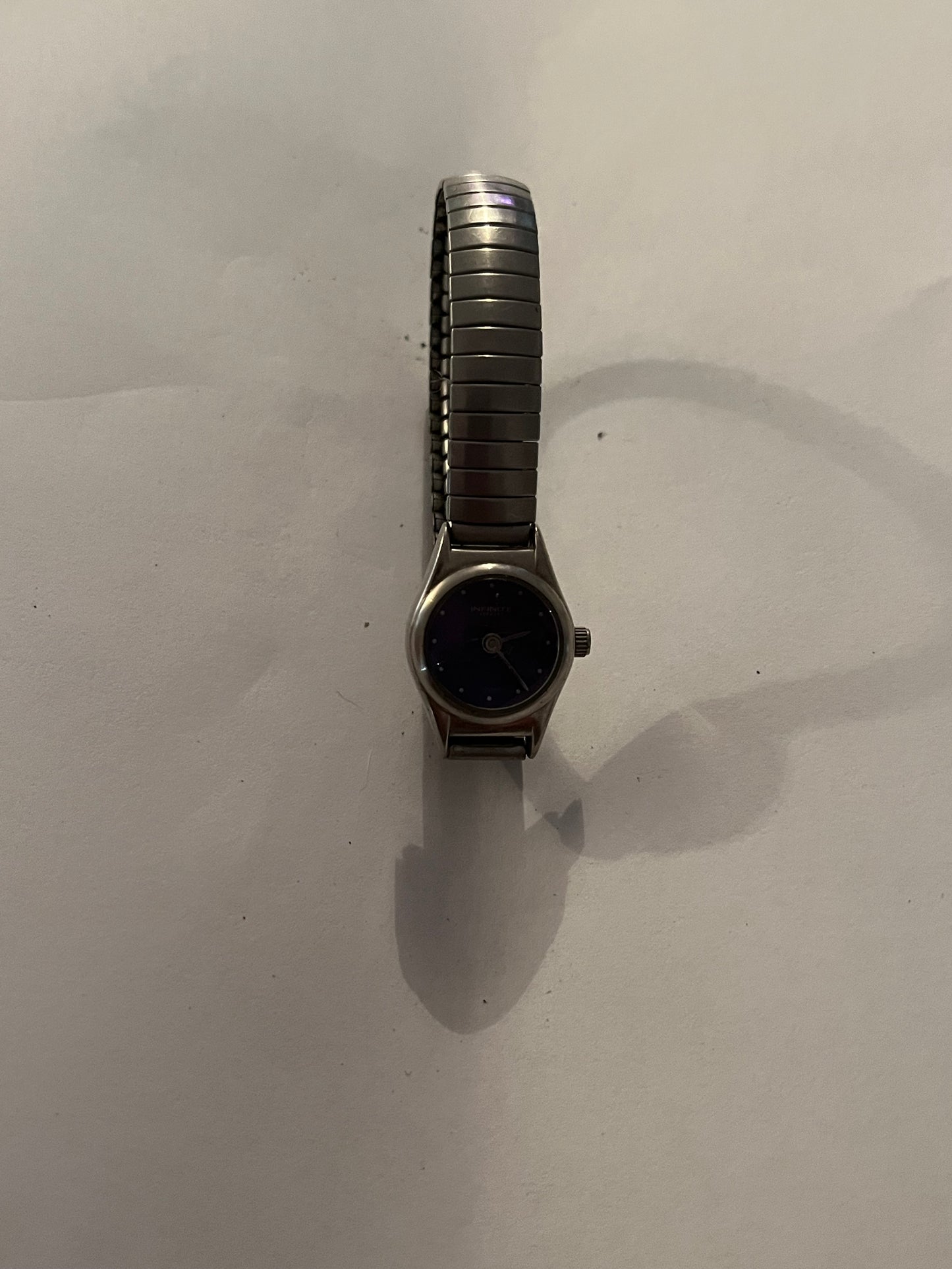 Infinite Purple fisheye ladies stretch watch - Untested