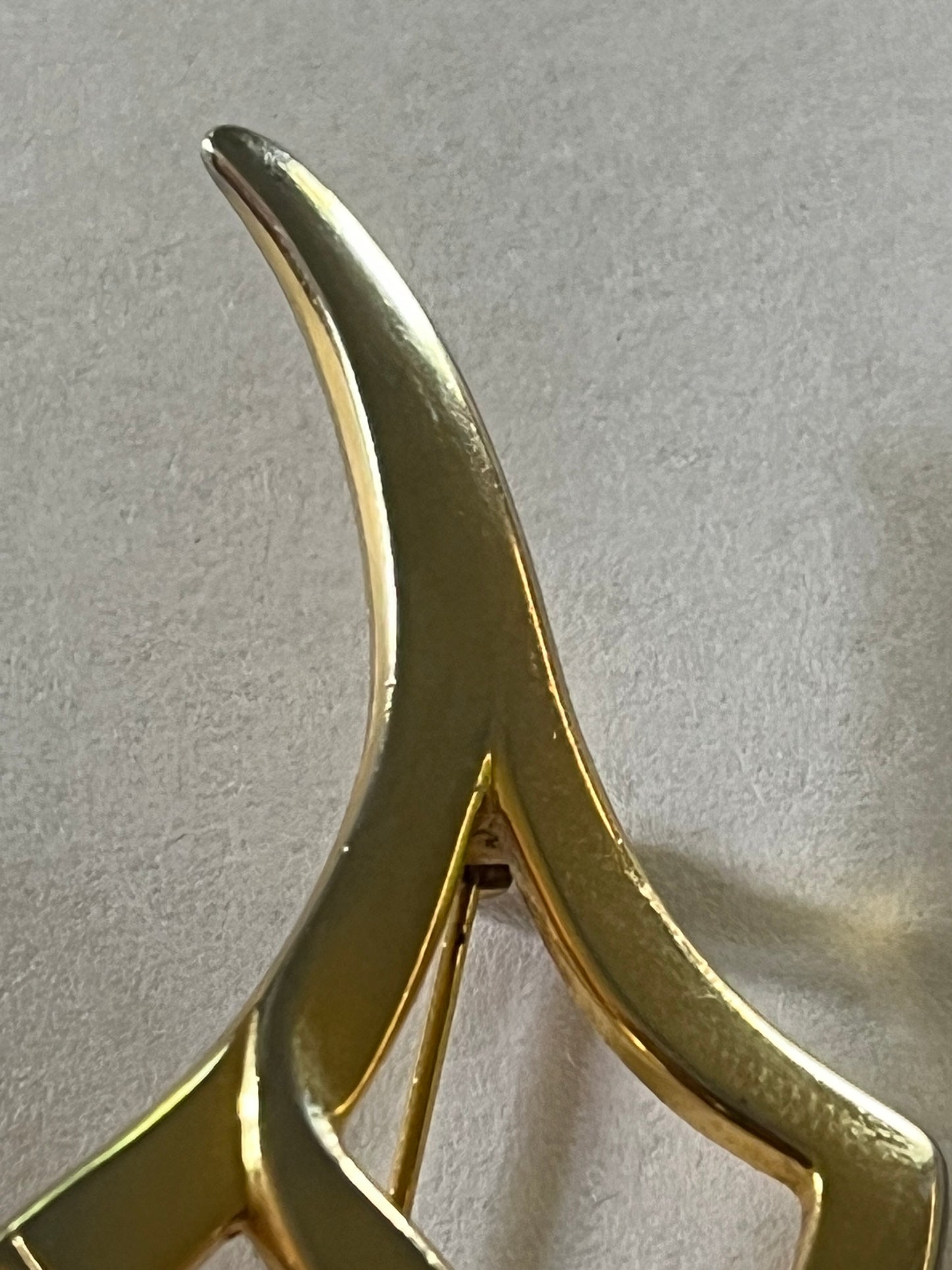 Curved Diamond Shaped Gold Metal Brooch with inlaid diamante