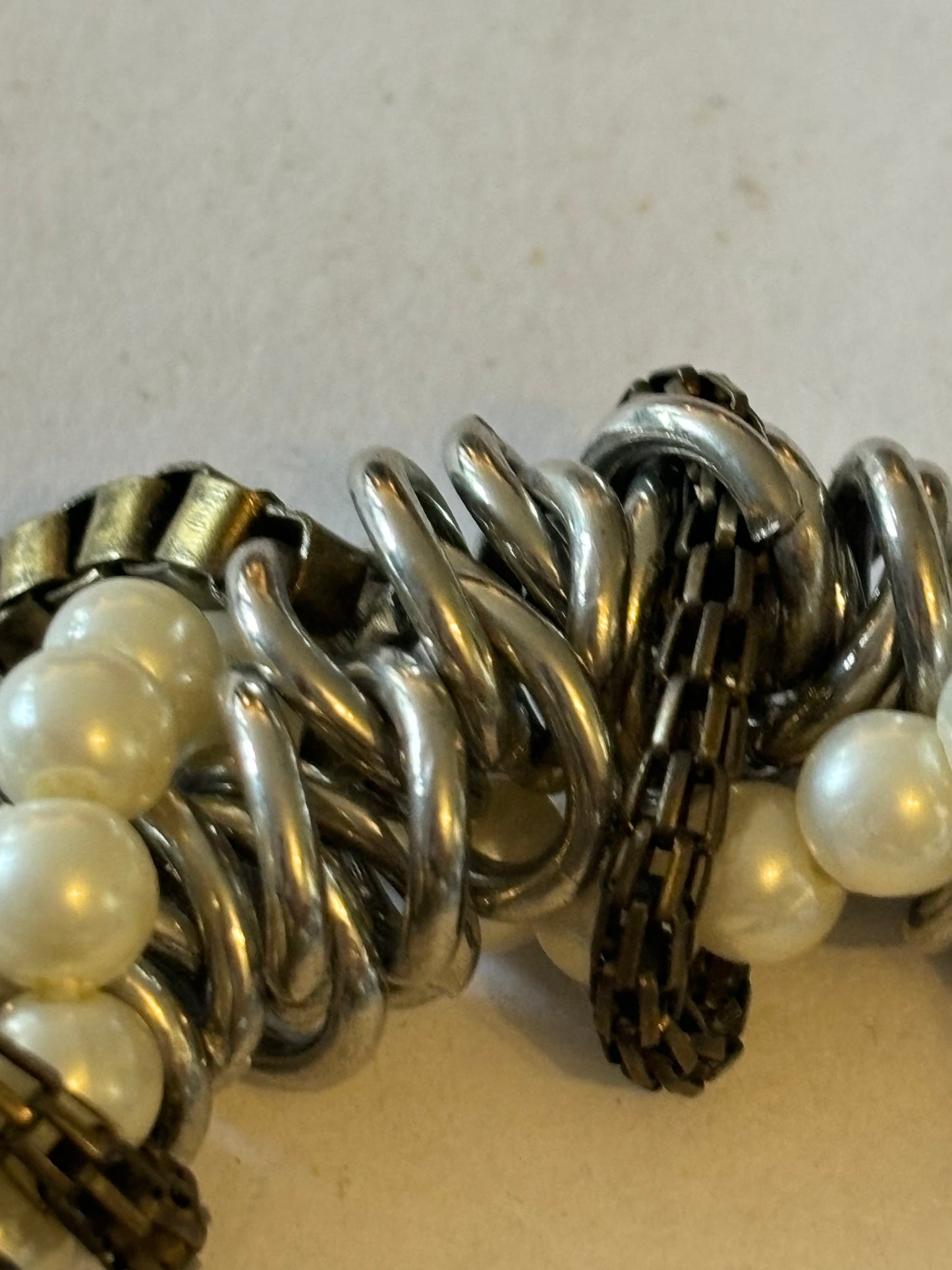 Silver rings, pearls and chain cluster bracelet