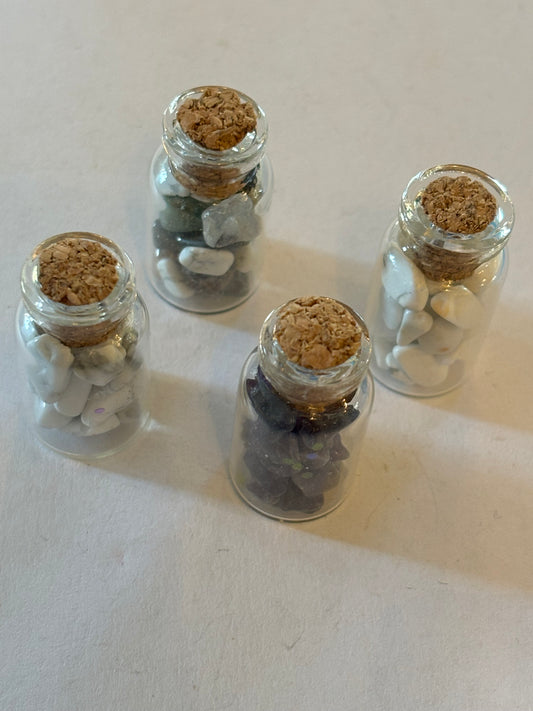 4x small glass vials of mineral stones